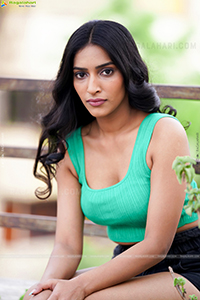 Nikita Gangurde in Cyan Green Crop Top and Black Shorts