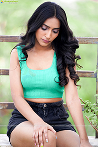 Nikita Gangurde in Cyan Green Crop Top and Black Shorts