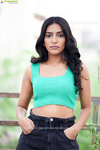 Nikita Gangurde in Cyan Green Crop Top and Black Shorts