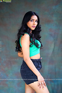 Nikita Gangurde in Cyan Green Crop Top and Black Shorts