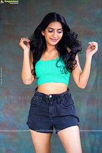 Nikita Gangurde in Cyan Green Crop Top and Black Shorts