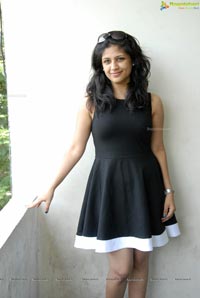 Supriya in Black Sleeveless Frock