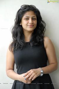 Supriya in Black Sleeveless Frock