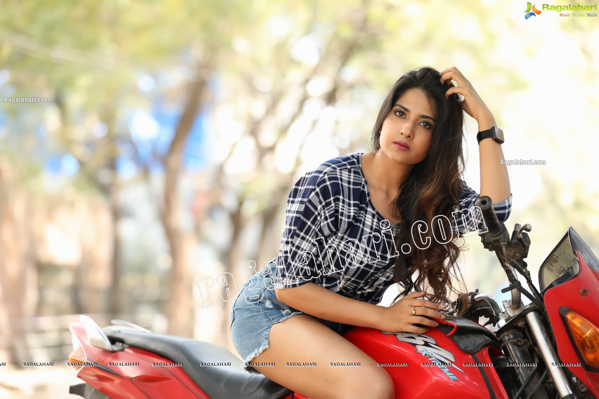 Simar Singh Posing on Motorcycle Exclusive Photo Shoot