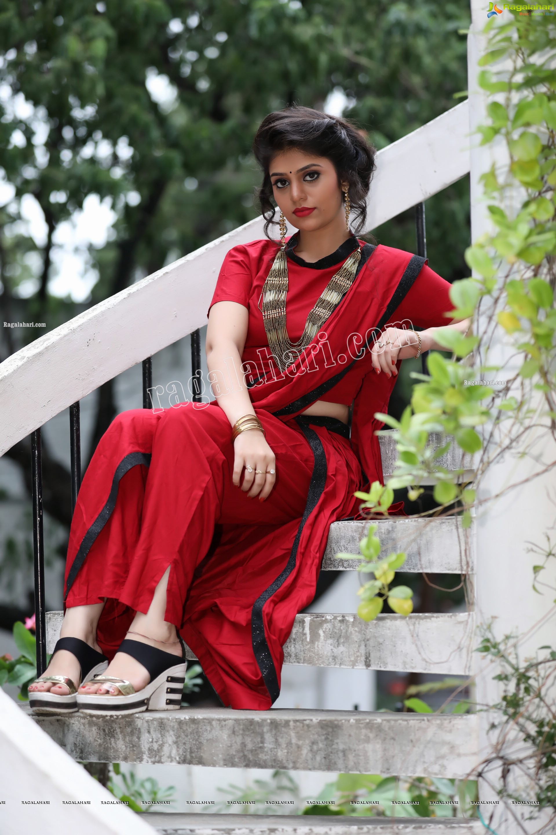 Viswa Sri Bandhavi in Red Dhoti Saree Exclusive Photo Shoot