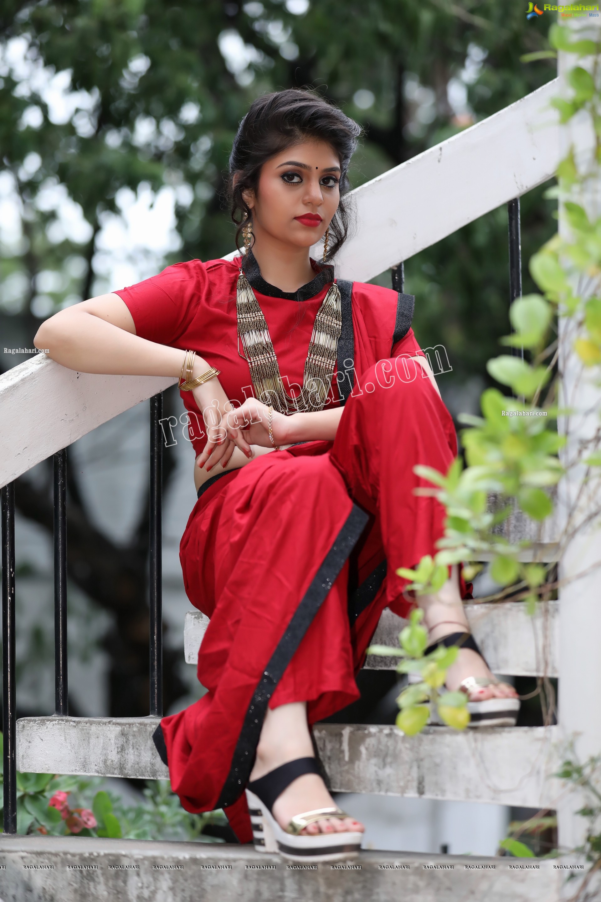 Viswa Sri Bandhavi in Red Dhoti Saree Exclusive Photo Shoot