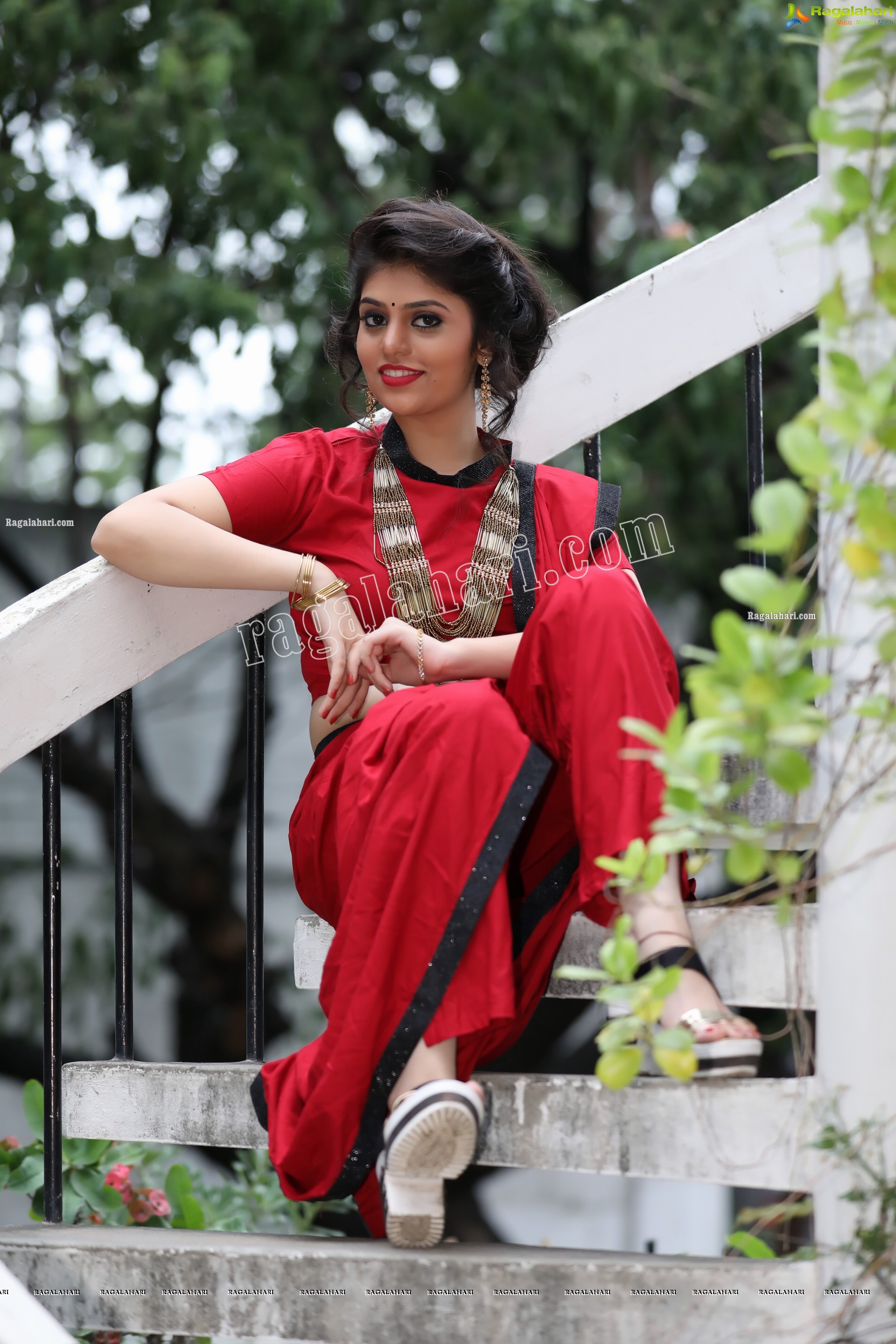 Viswa Sri Bandhavi in Red Dhoti Saree Exclusive Photo Shoot