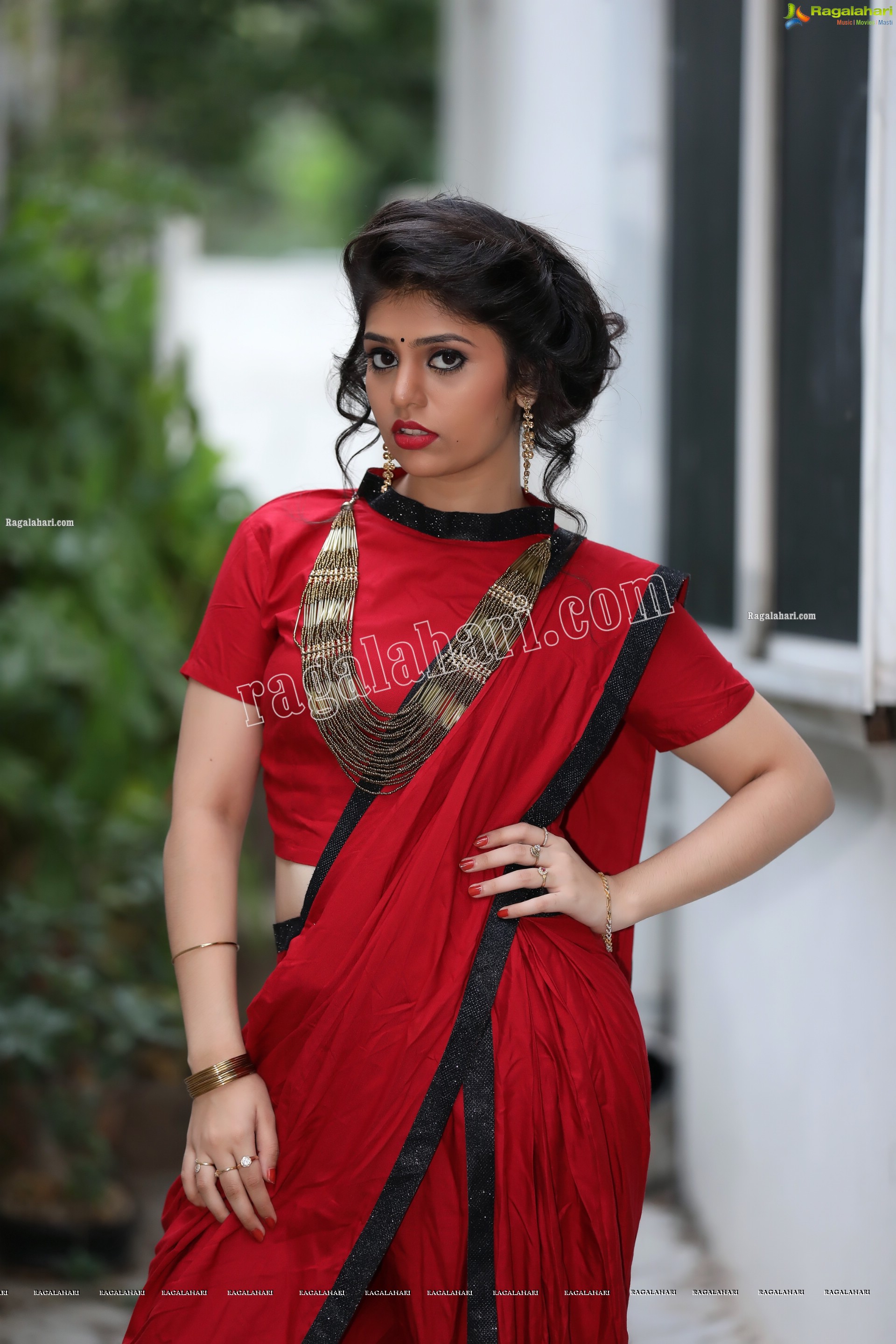 Viswa Sri Bandhavi in Red Dhoti Saree Exclusive Photo Shoot