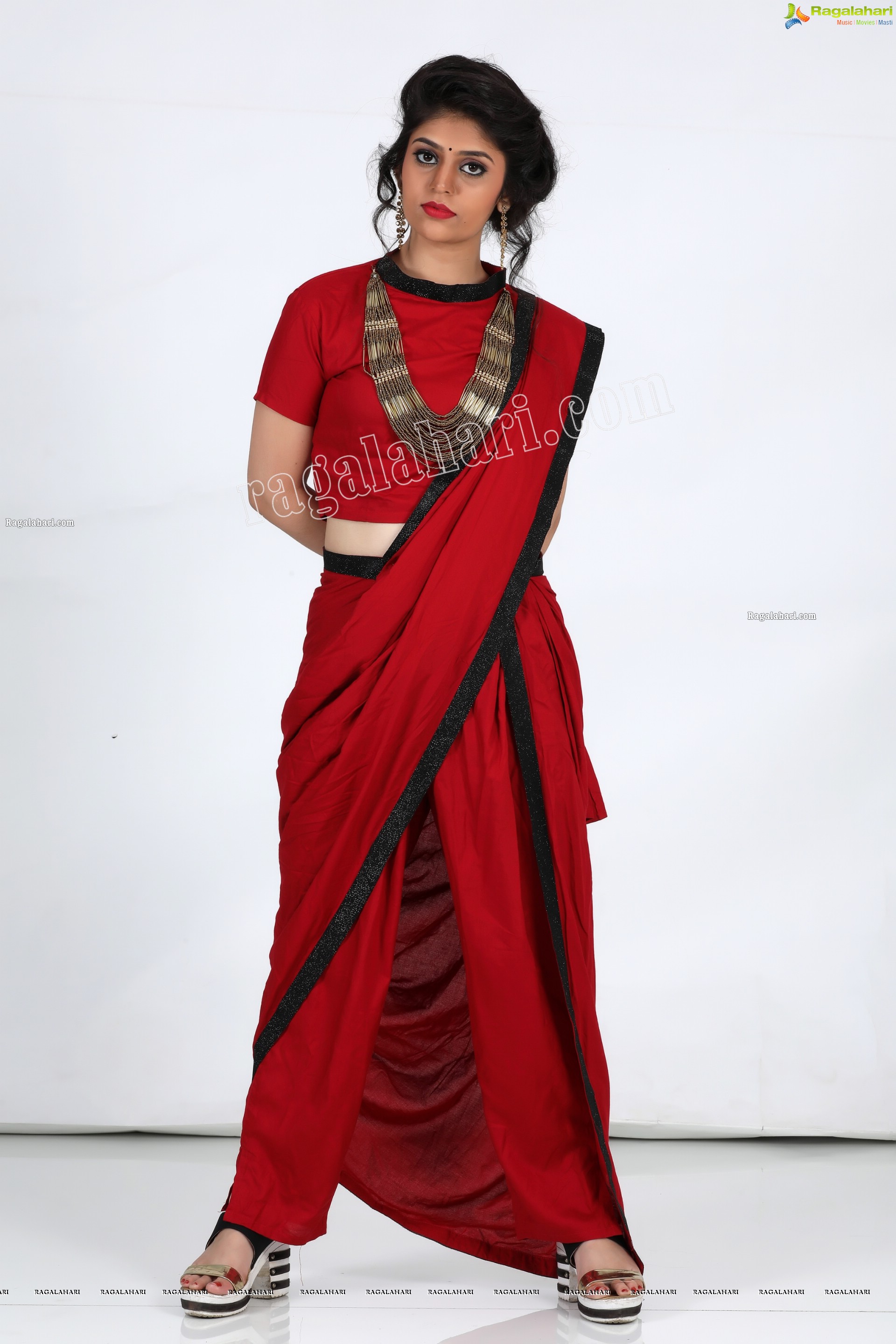 Viswa Sri Bandhavi in Red Dhoti Saree Exclusive Photo Shoot