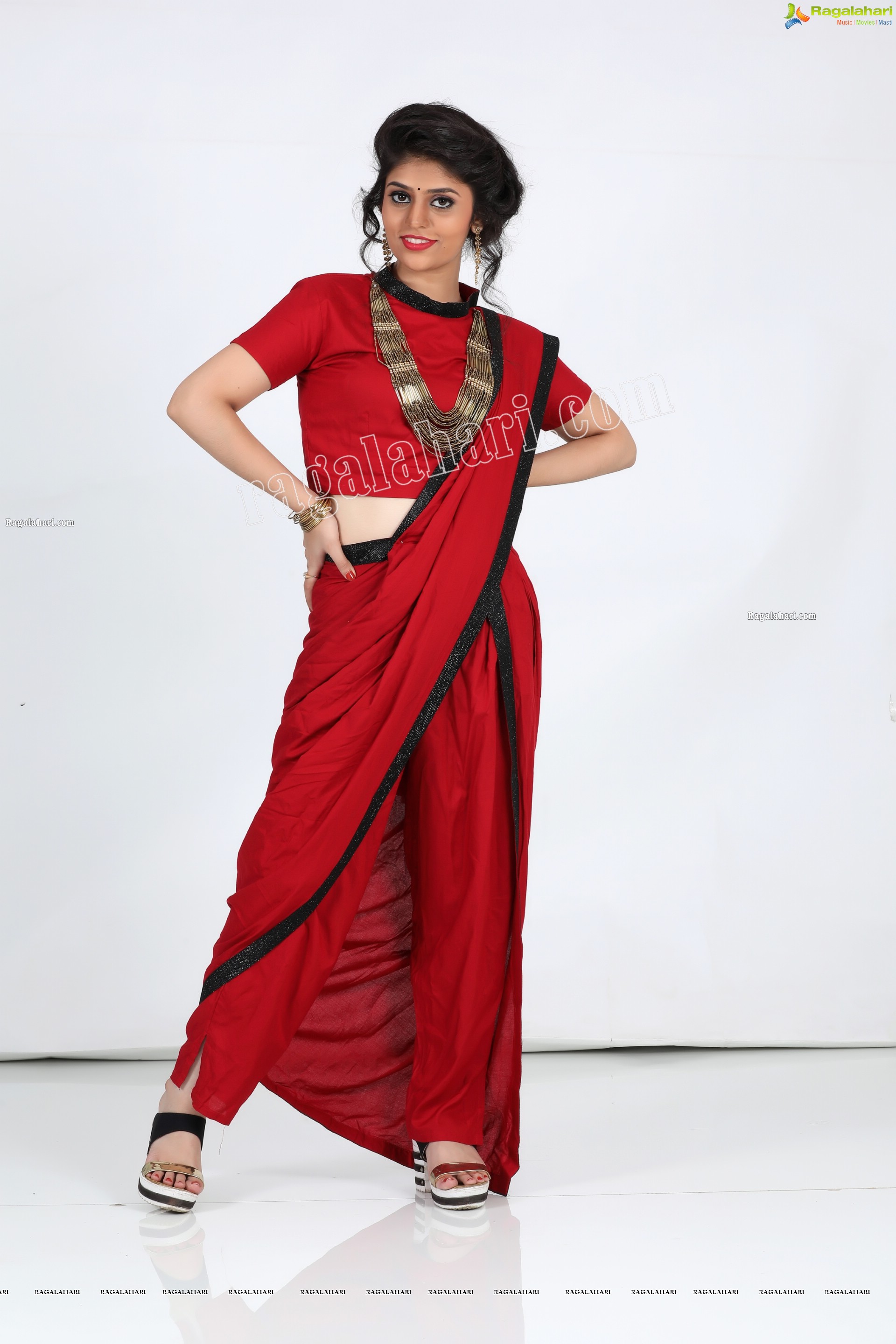 Viswa Sri Bandhavi in Red Dhoti Saree Exclusive Photo Shoot