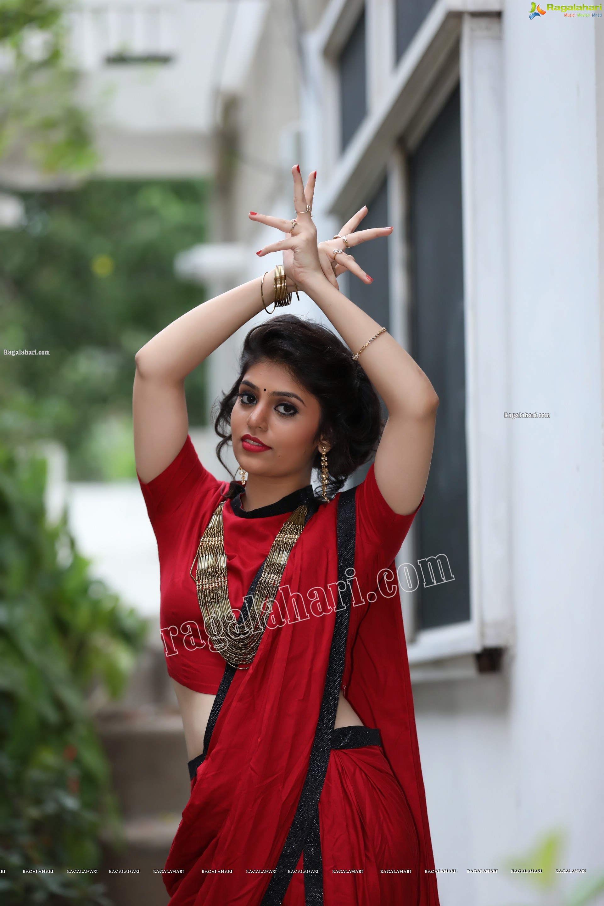 Viswa Sri Bandhavi in Red Dhoti Saree Exclusive Photo Shoot