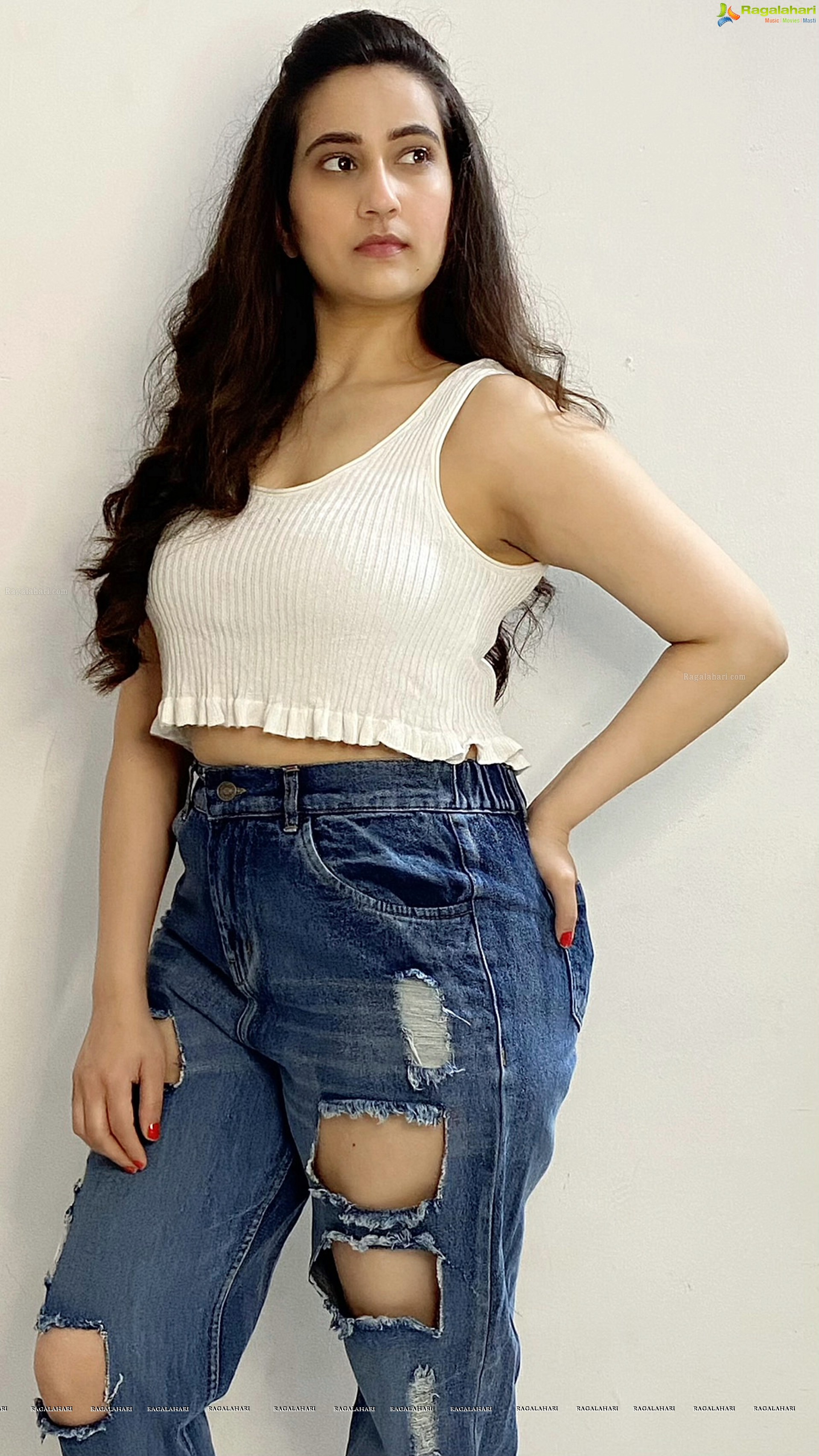 Manjusha in White Smocked Crop Top and Ripped Jeans, HD Stills