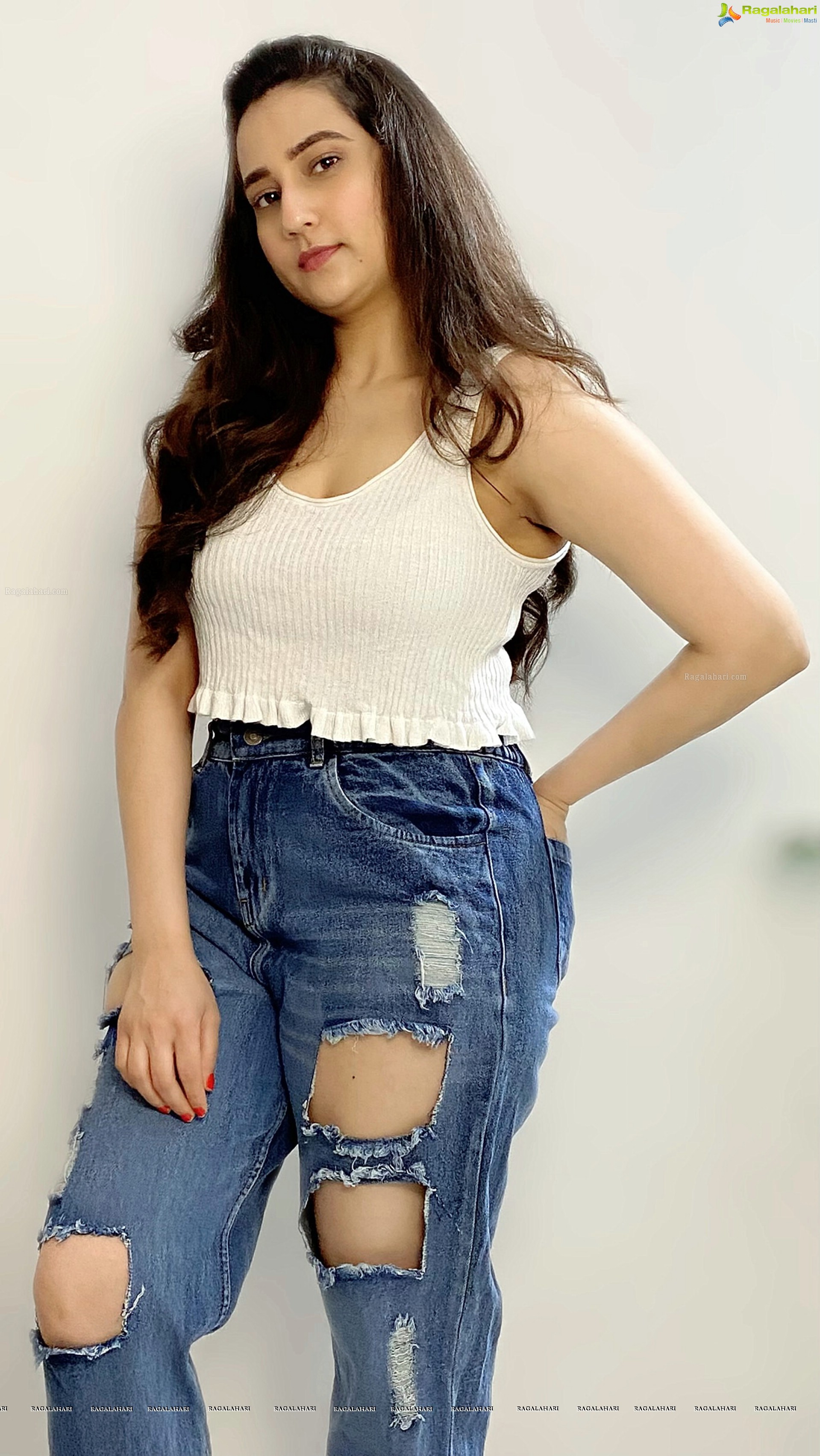 Manjusha in White Smocked Crop Top and Ripped Jeans, HD Stills