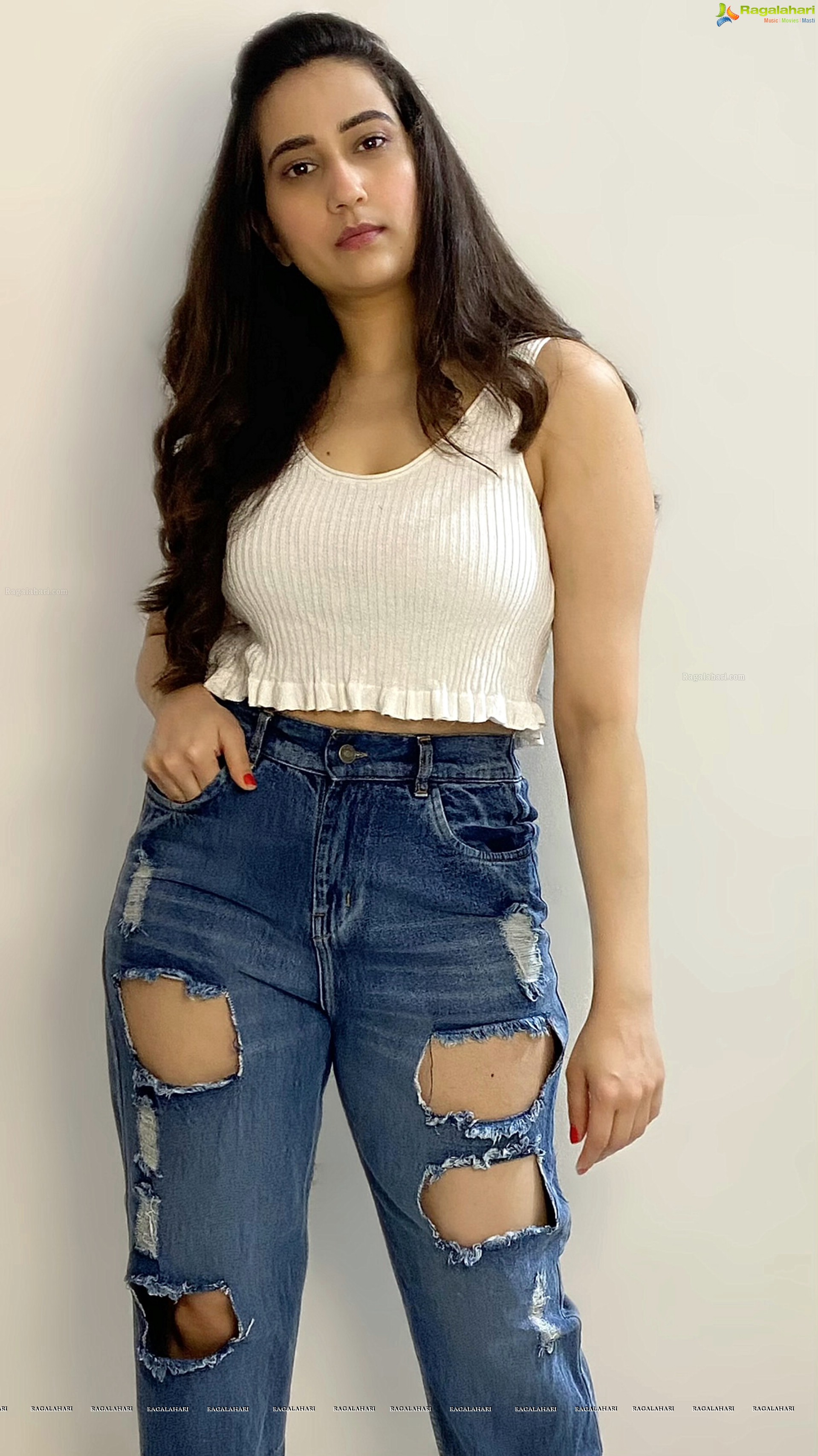Manjusha in White Smocked Crop Top and Ripped Jeans, HD Stills