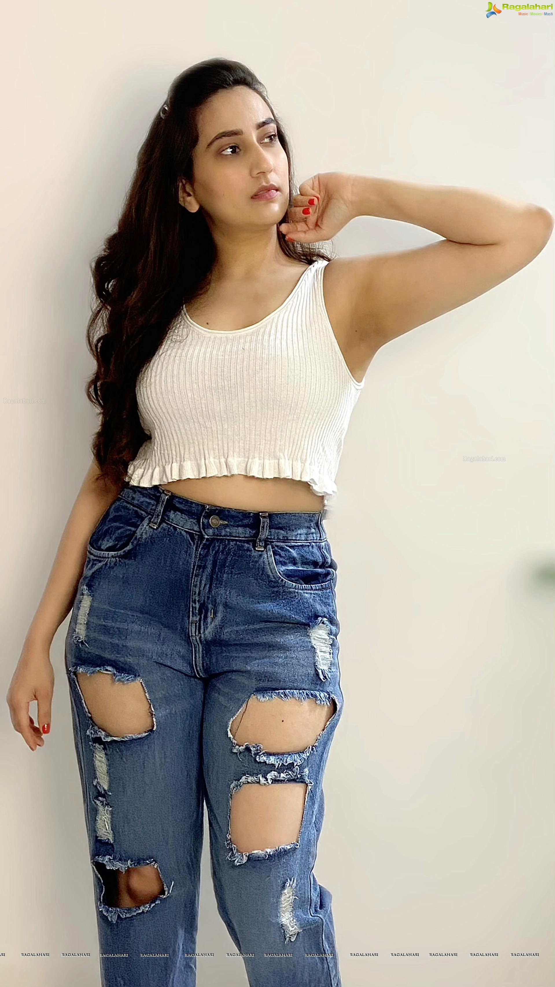 Manjusha in White Smocked Crop Top and Ripped Jeans, HD Stills