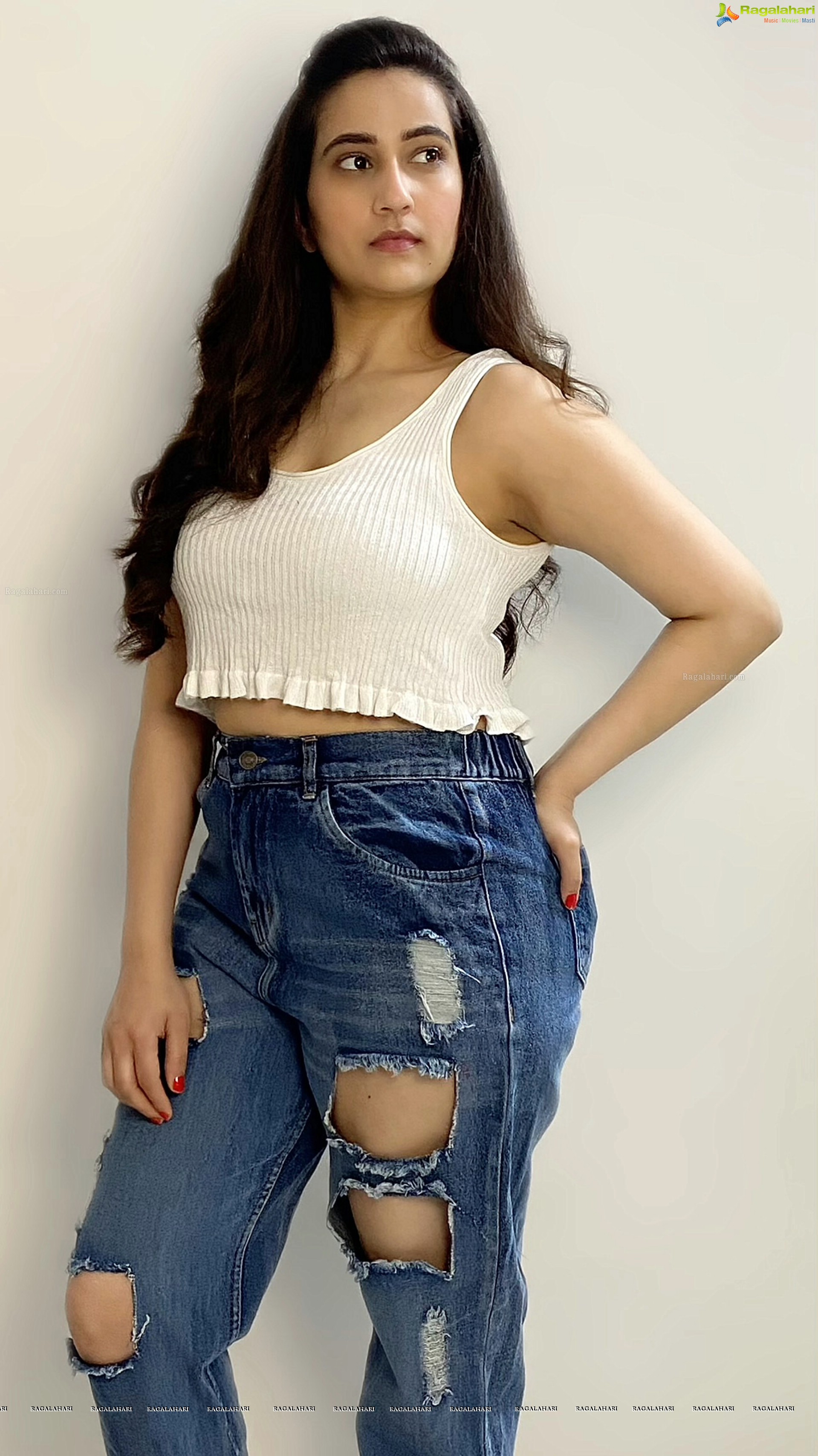 Manjusha in White Smocked Crop Top and Ripped Jeans, HD Stills