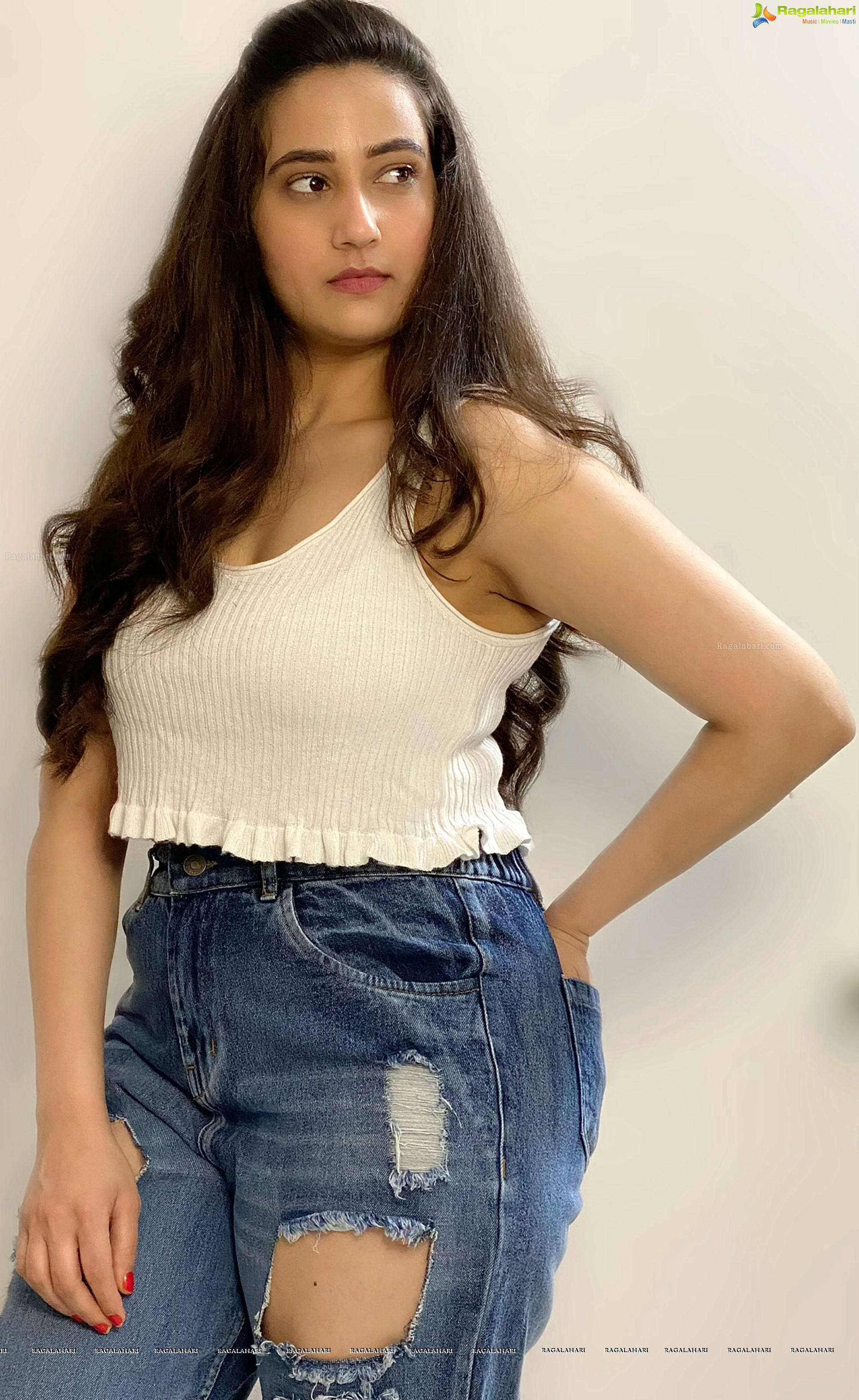 Manjusha in White Smocked Crop Top and Ripped Jeans, HD Stills