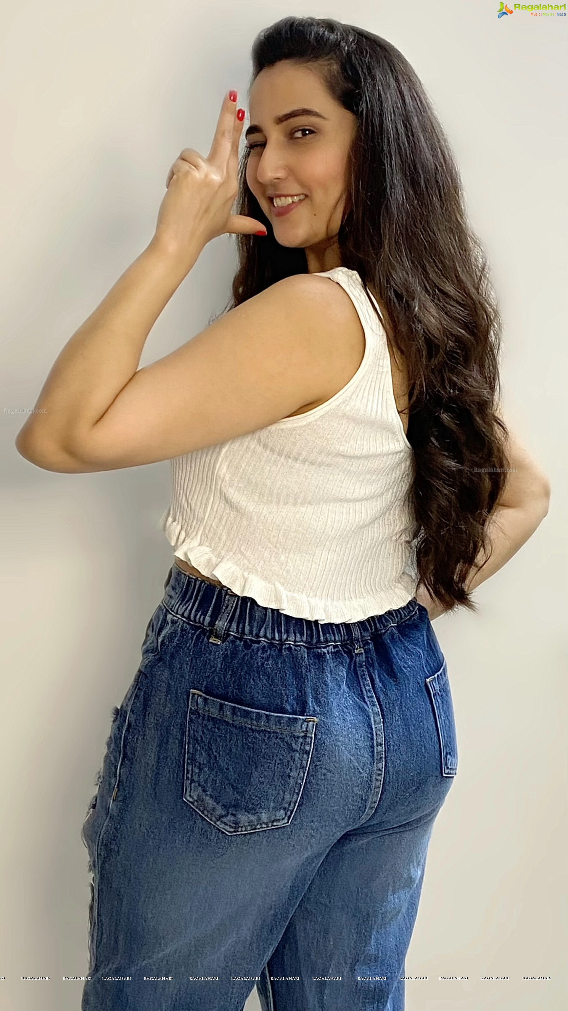 Manjusha in White Smocked Crop Top and Ripped Jeans, HD Stills