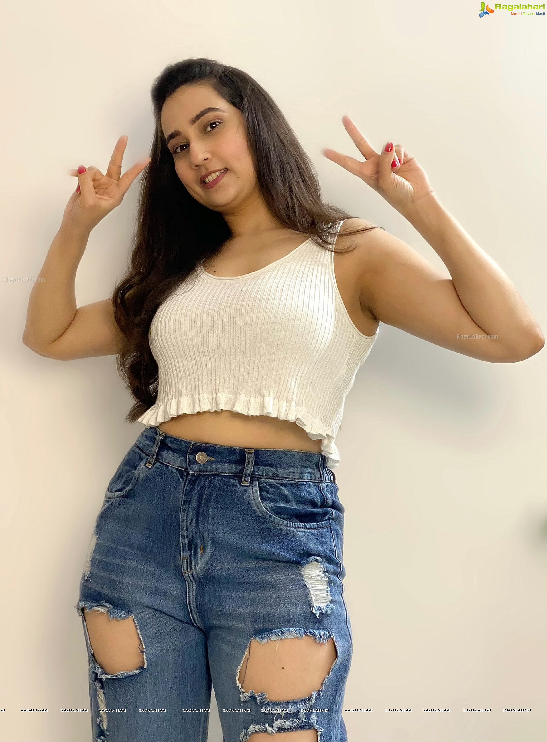 Manjusha in White Smocked Crop Top and Ripped Jeans, HD Stills