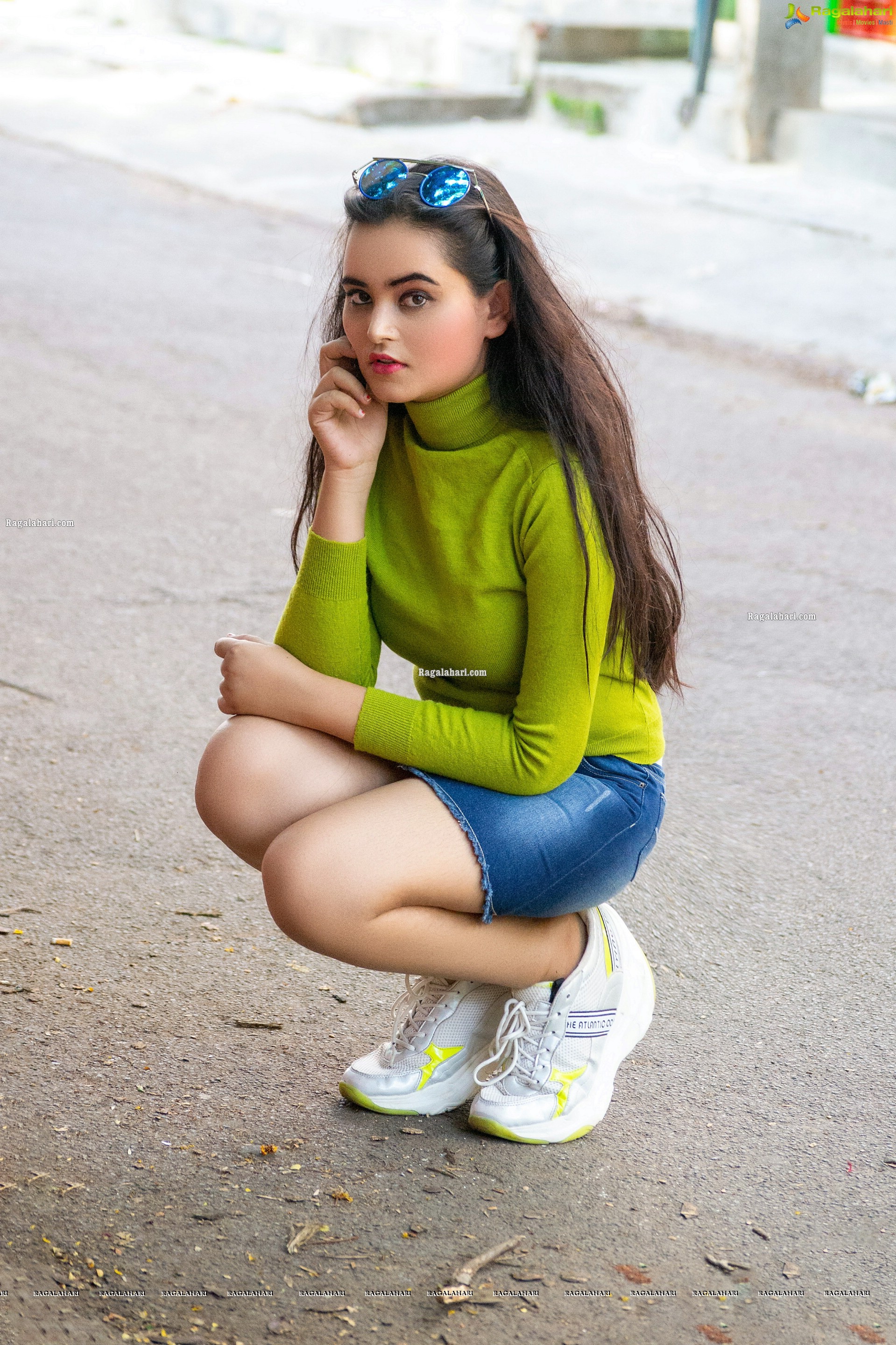 Vaanya Aggarwal in Green Knitted T-Shirt and Denim Mini Skirt, HD Stills