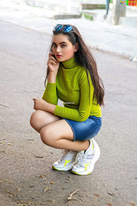 Vaanya Aggarwal in Green Knitted T-Shirt and Denim Skirt