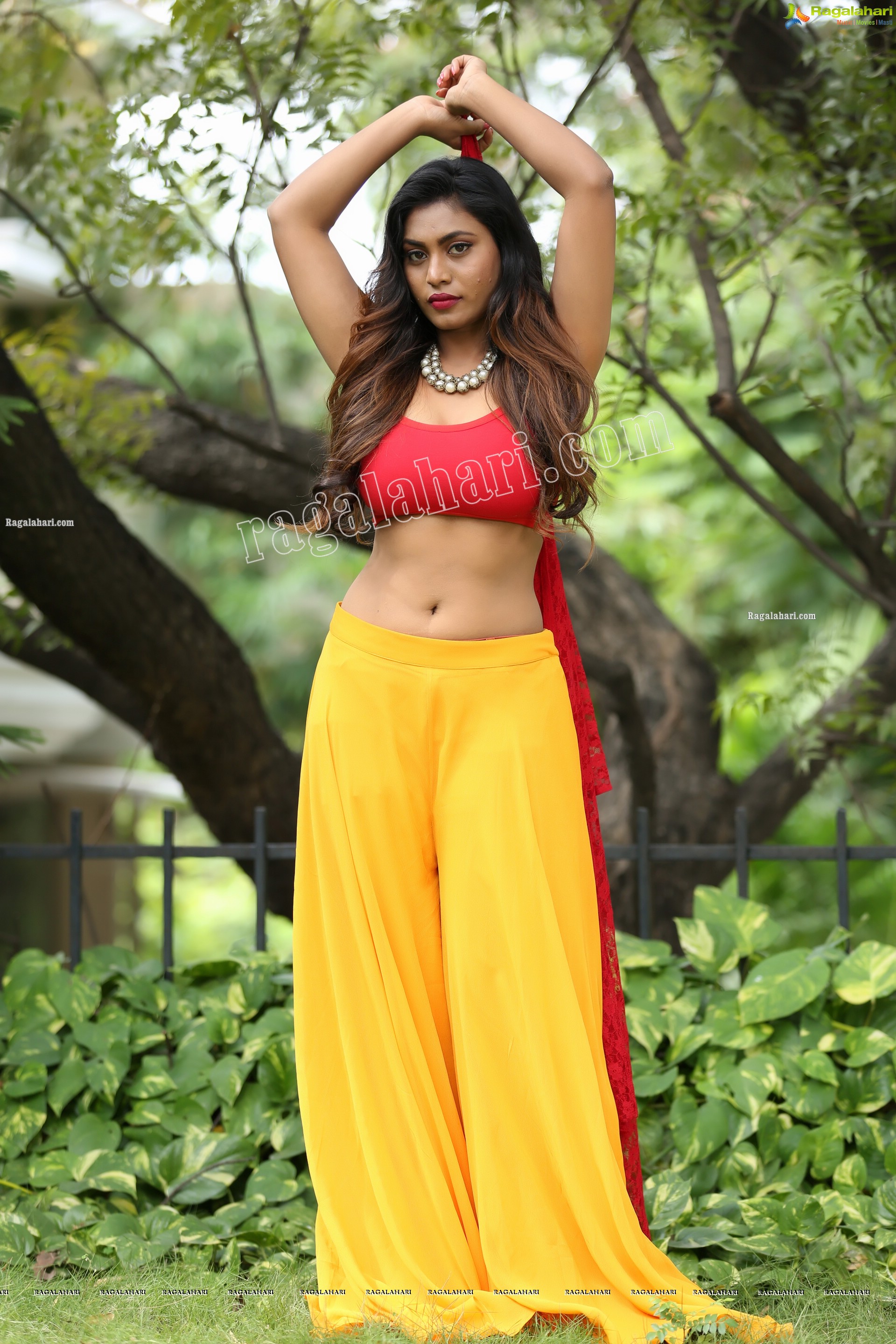 Priyanka Augustin in Yellow Divided Skirt and Red Crop Top, Exclusive Photo Shoot