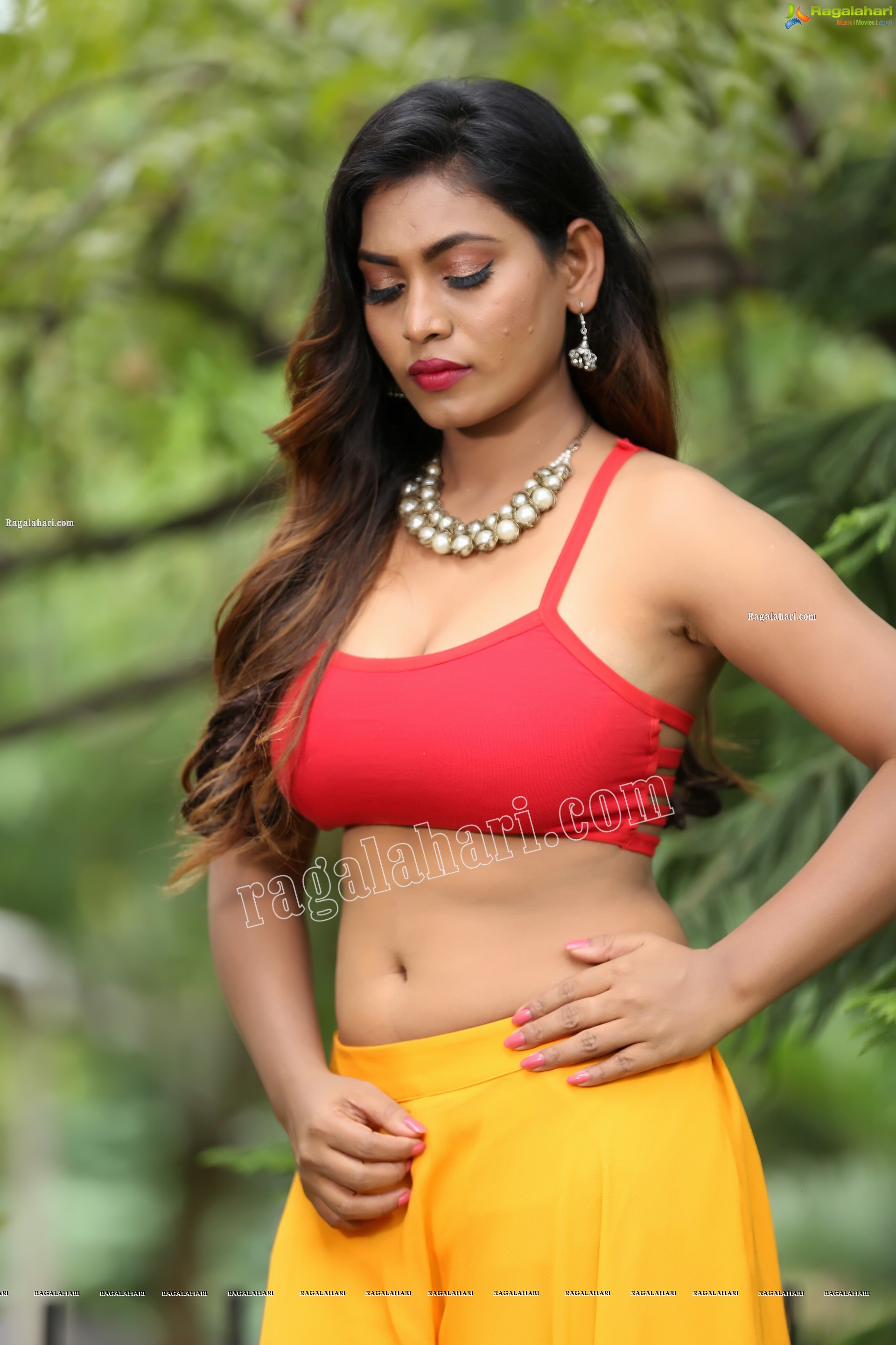 Priyanka Augustin in Yellow Divided Skirt and Red Crop Top, Exclusive Photo Shoot