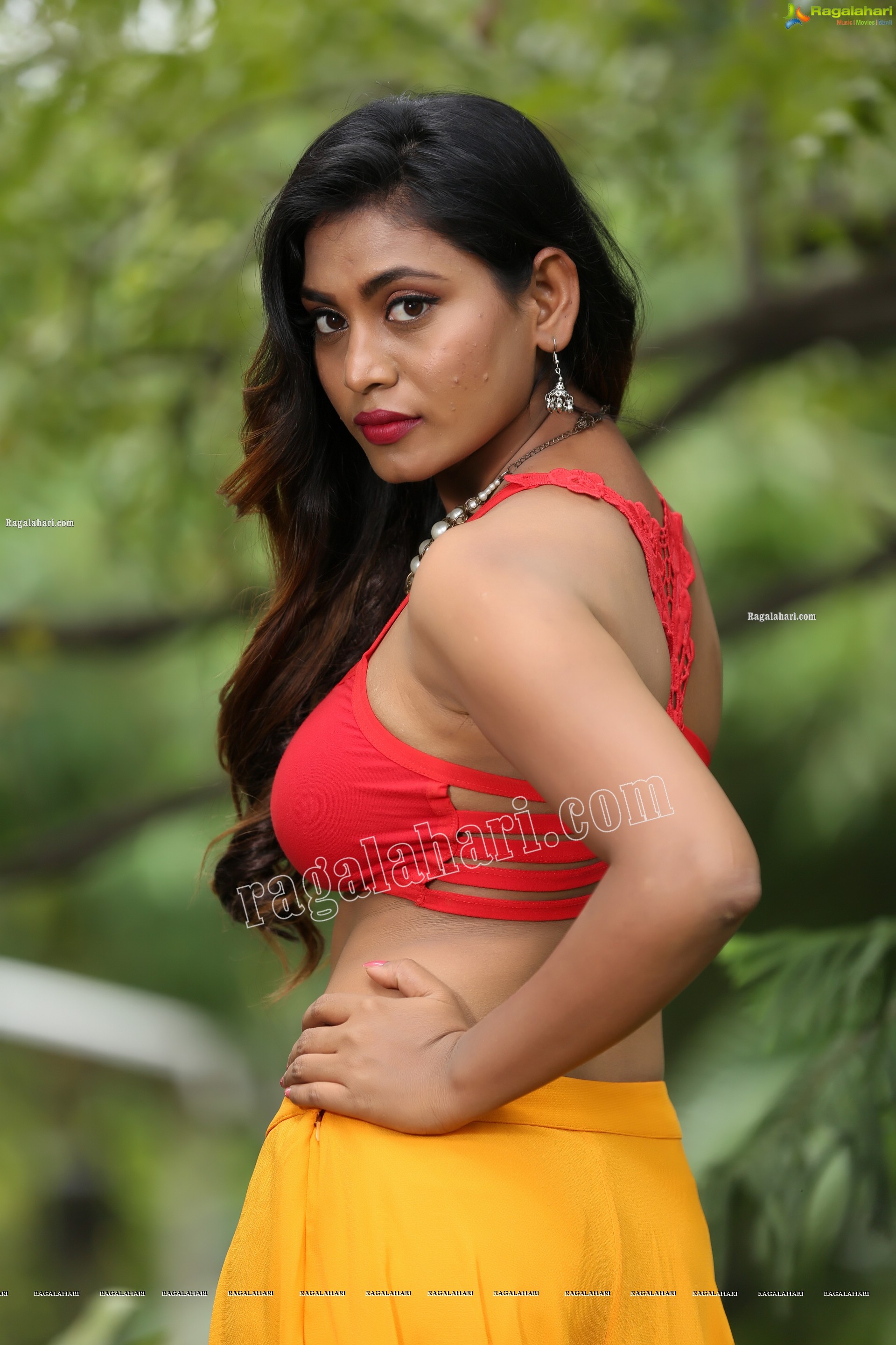 Priyanka Augustin in Yellow Divided Skirt and Red Crop Top, Exclusive Photo Shoot