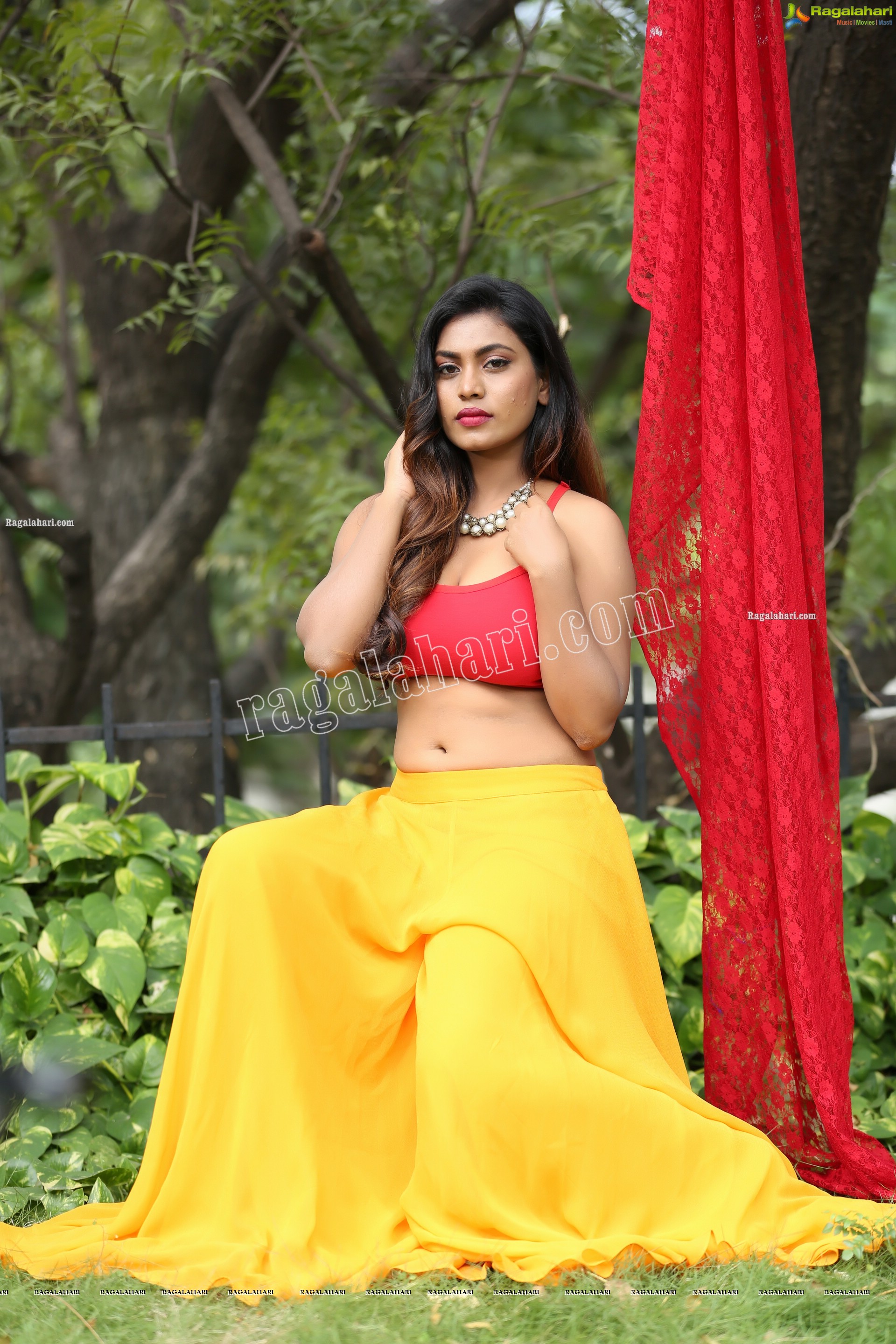 Priyanka Augustin in Yellow Divided Skirt and Red Crop Top, Exclusive Photo Shoot