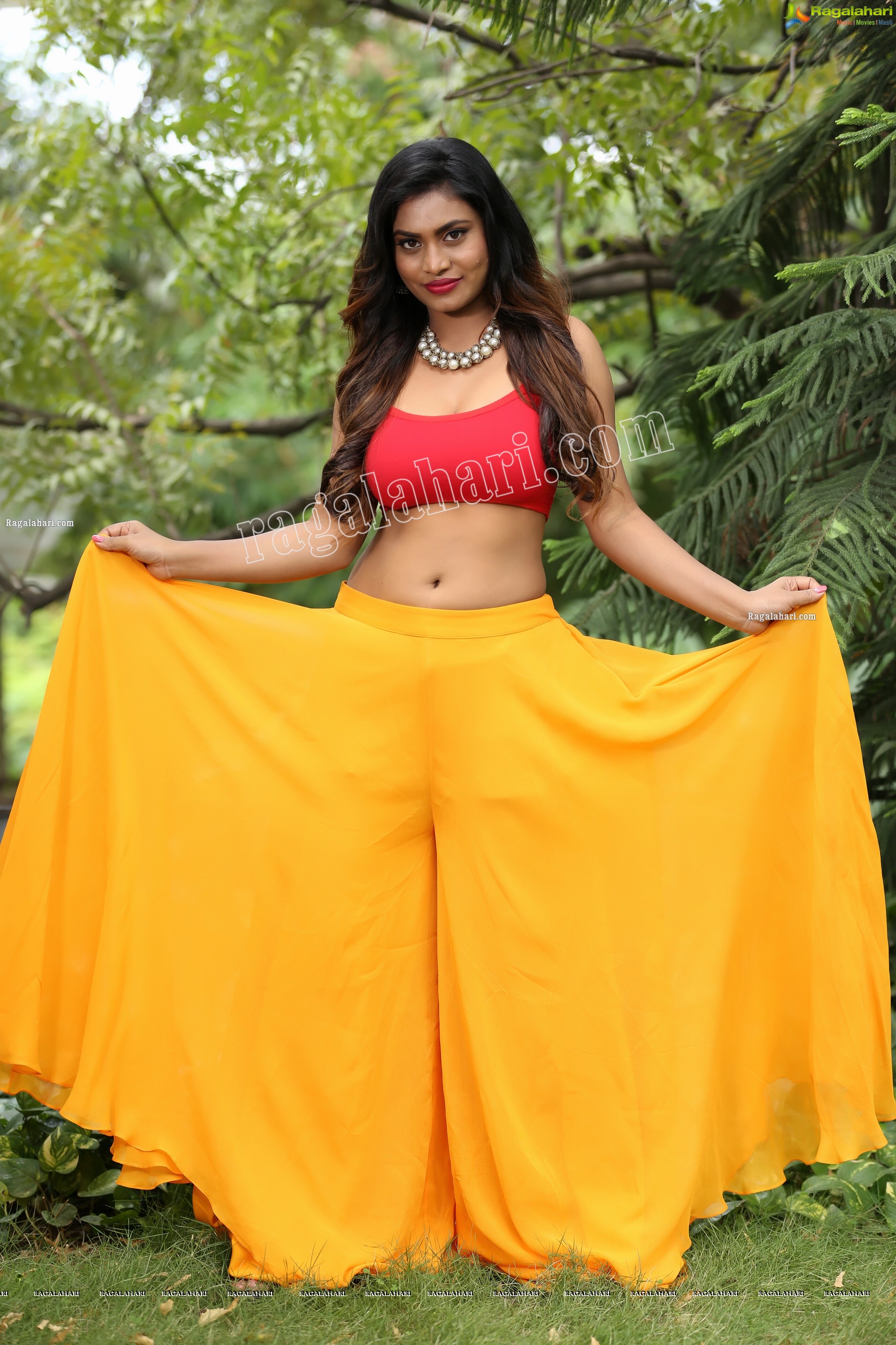 Priyanka Augustin in Yellow Divided Skirt and Red Crop Top, Exclusive Photo Shoot