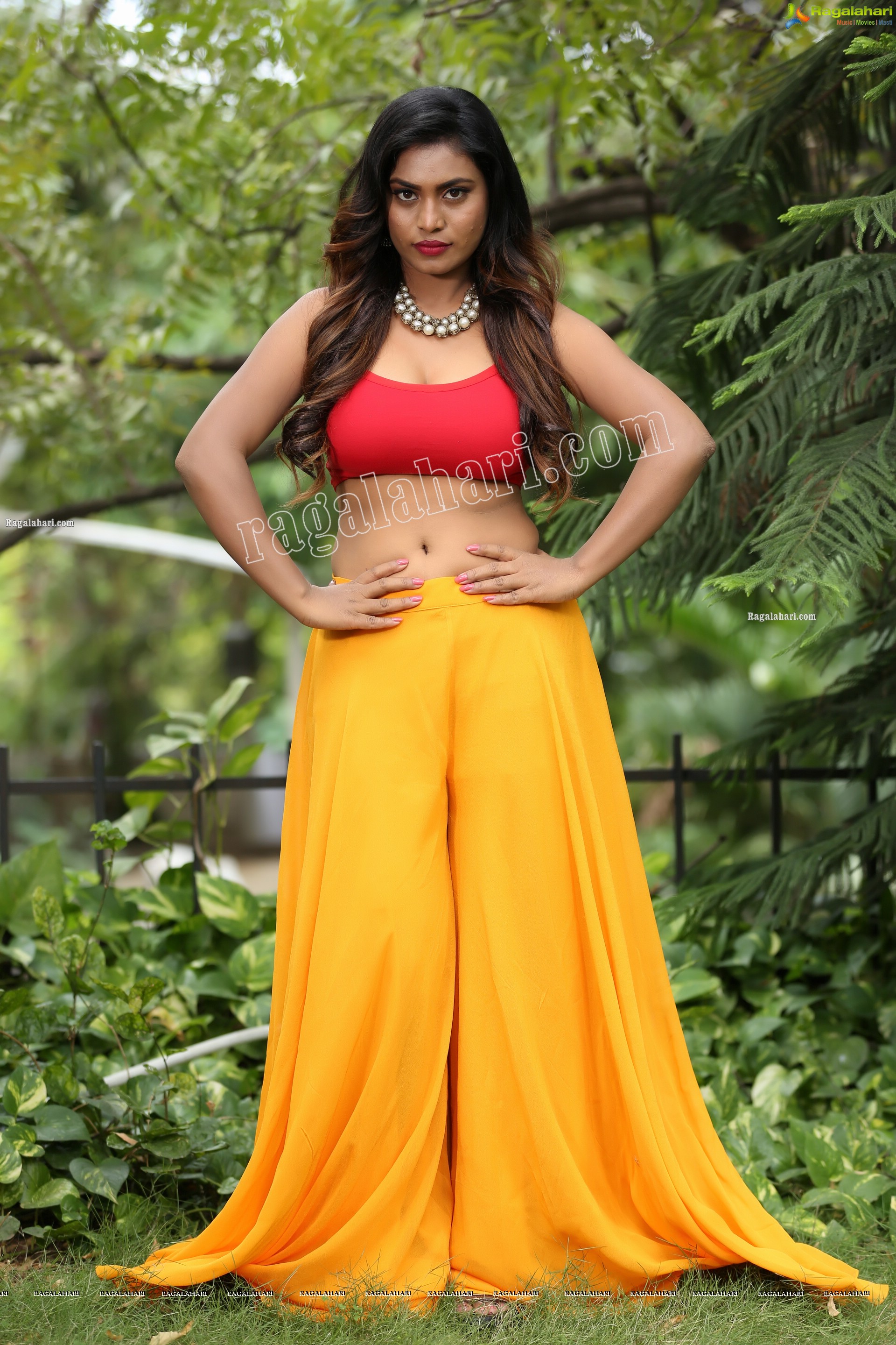 Priyanka Augustin in Yellow Divided Skirt and Red Crop Top, Exclusive Photo Shoot