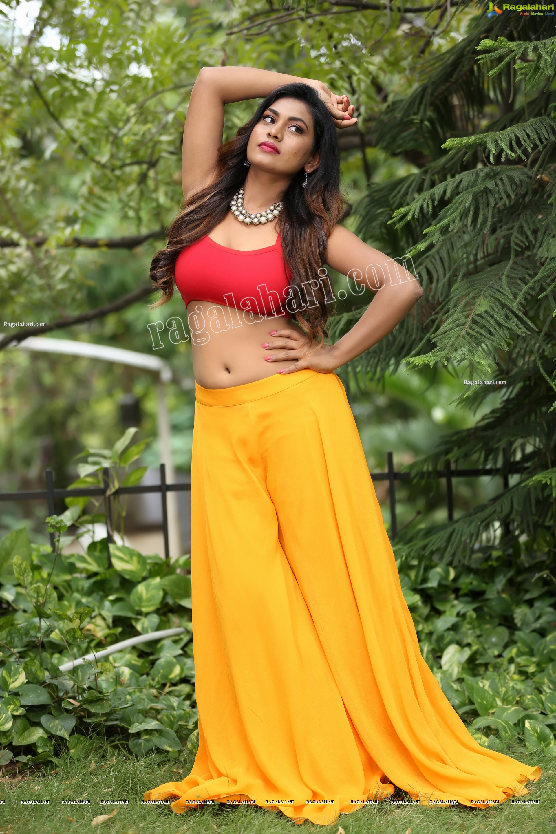 Priyanka Augustin in Yellow Divided Skirt and Red Crop Top, Exclusive Photo Shoot