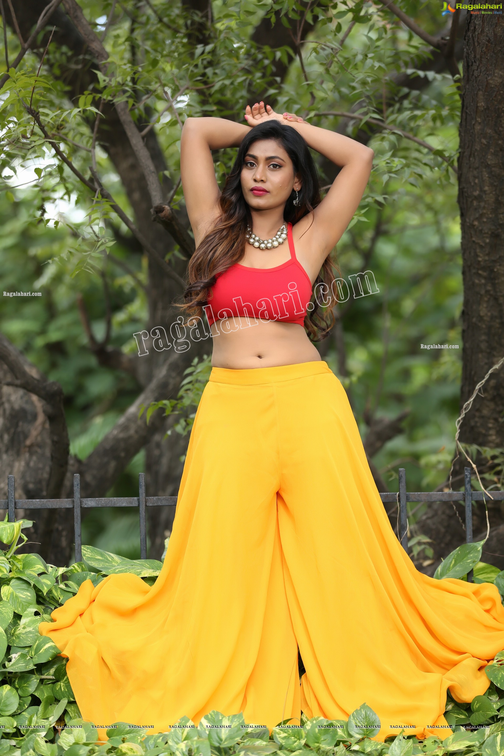 Priyanka Augustin in Yellow Divided Skirt and Red Crop Top, Exclusive Photo Shoot