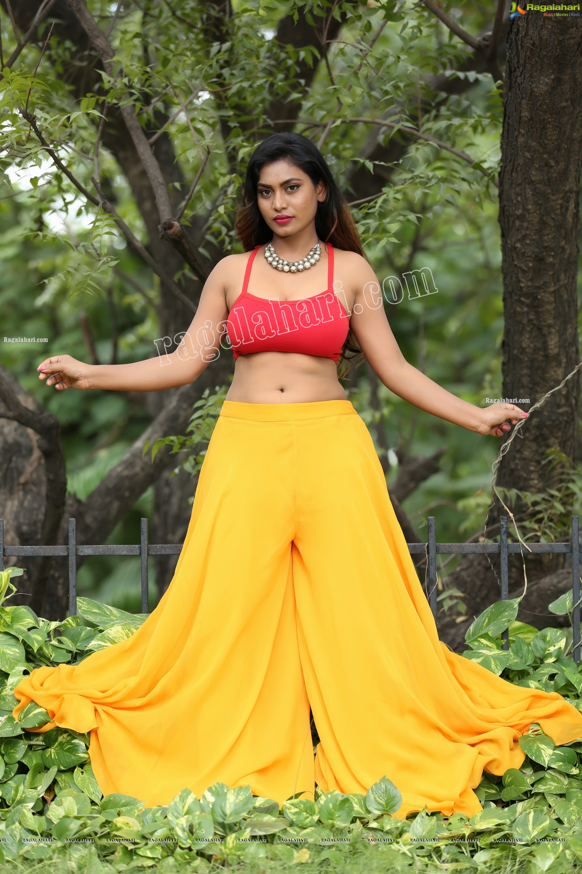 Priyanka Augustin in Yellow Divided Skirt and Red Crop Top, Exclusive Photo Shoot