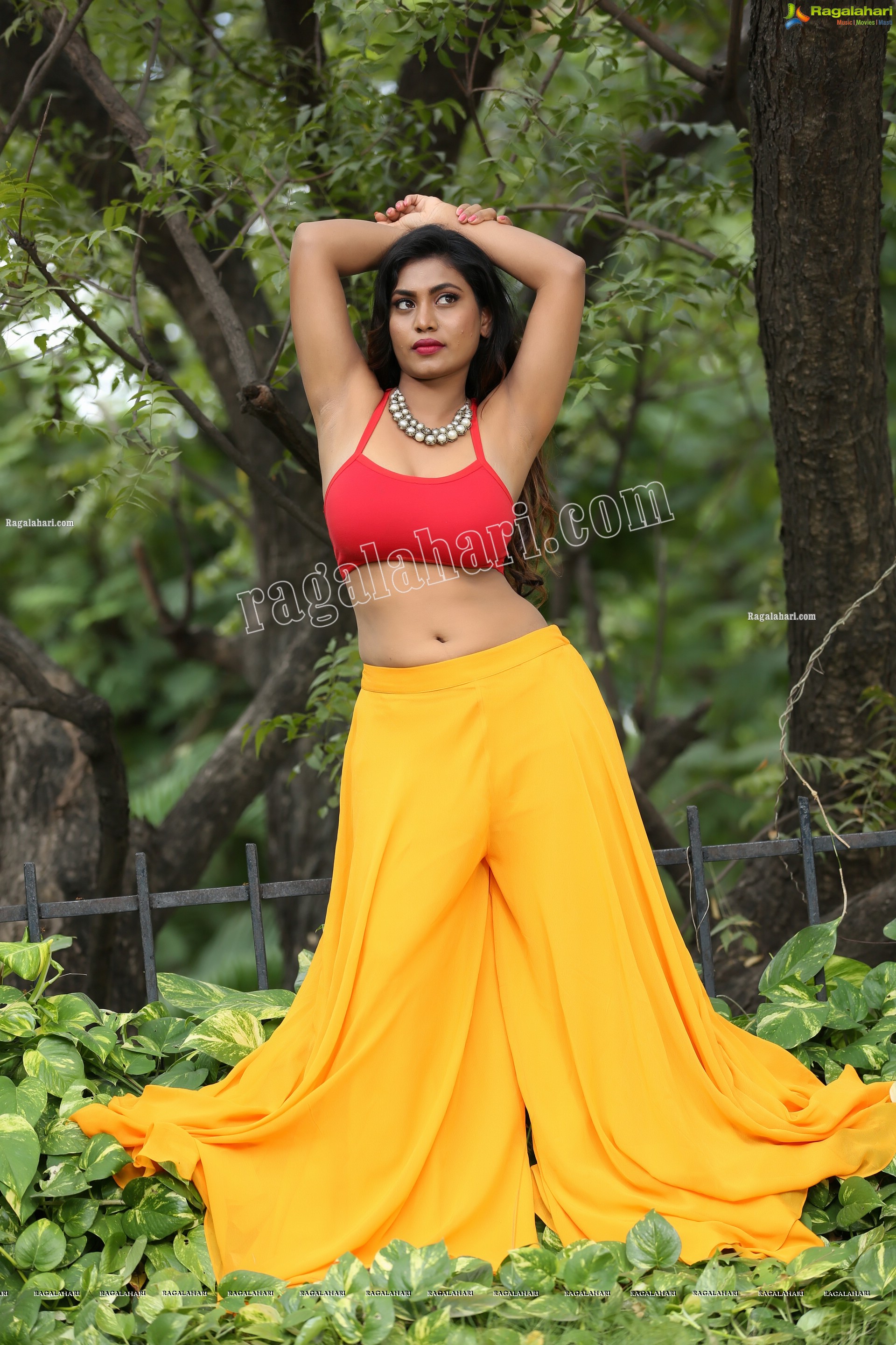 Priyanka Augustin in Yellow Divided Skirt and Red Crop Top, Exclusive Photo Shoot