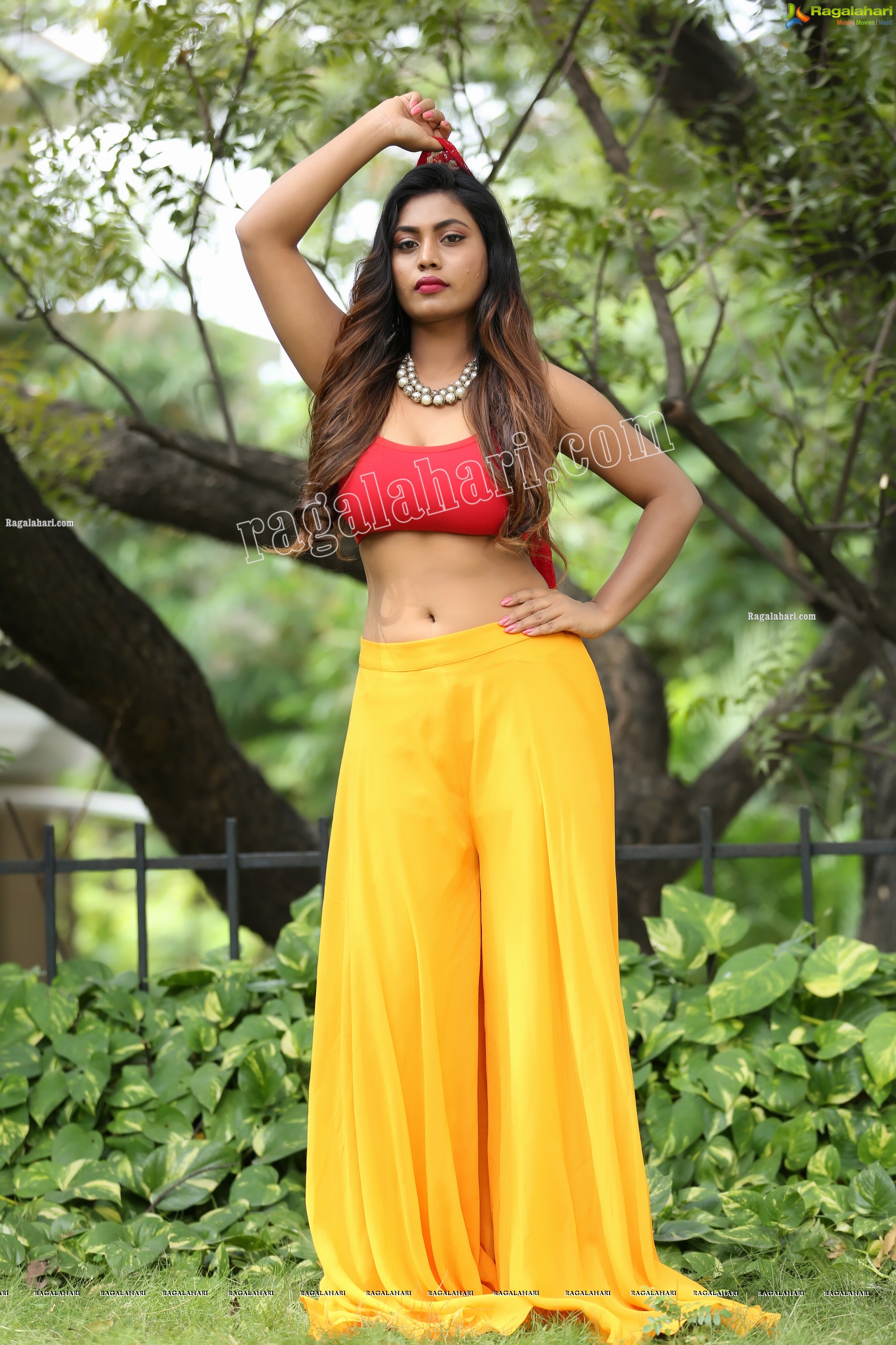 Priyanka Augustin in Yellow Divided Skirt and Red Crop Top, Exclusive Photo Shoot