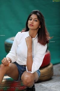 Sulagna Karmakar in White Crop Top and Denim Shorts