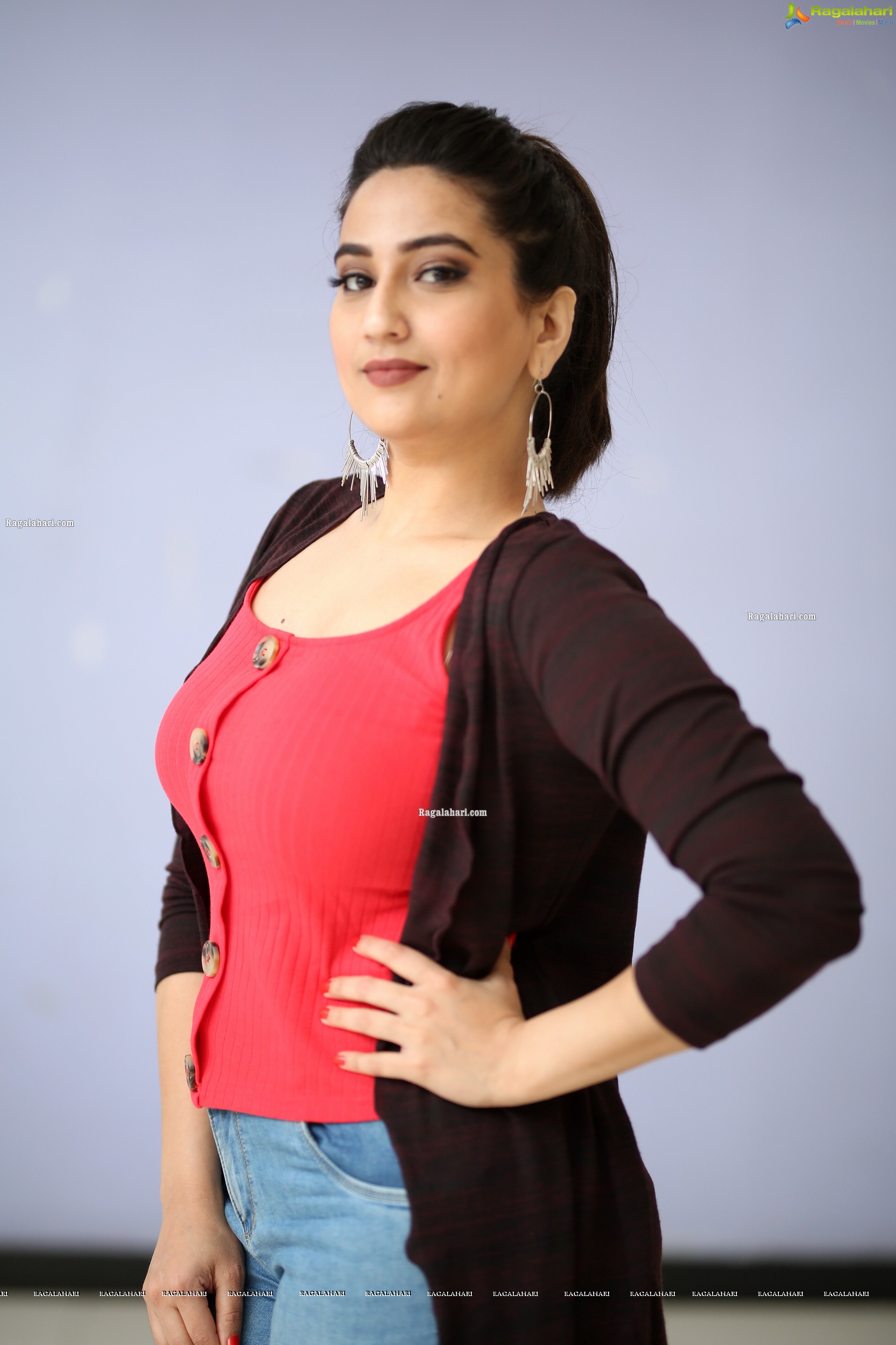 Manjusha in Pink Top and Blue Jeans With Long Shrug Exclusive Photoshoot