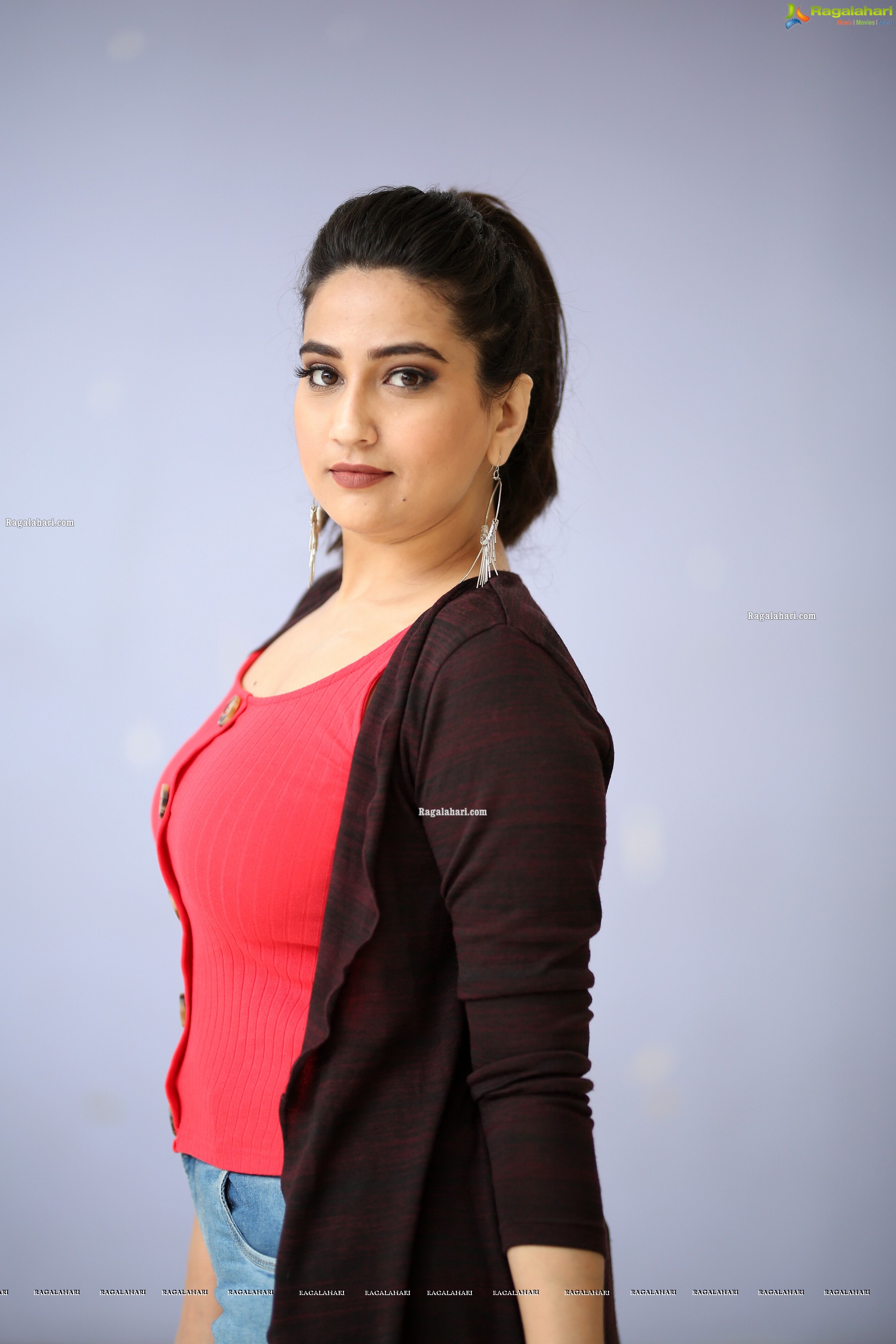 Manjusha in Pink Top and Blue Jeans With Long Shrug Exclusive Photoshoot