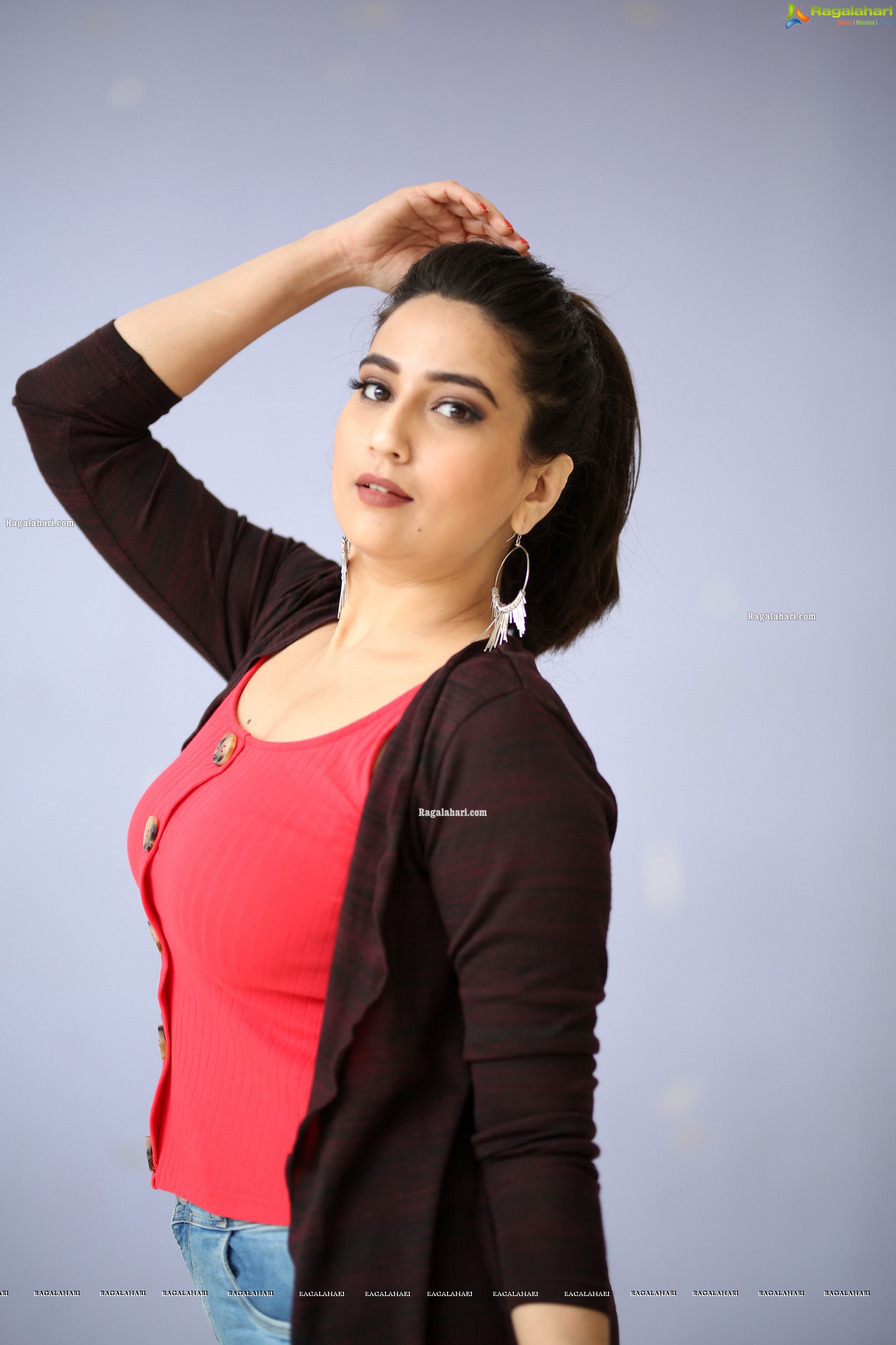 Manjusha in Pink Top and Blue Jeans With Long Shrug Exclusive Photoshoot