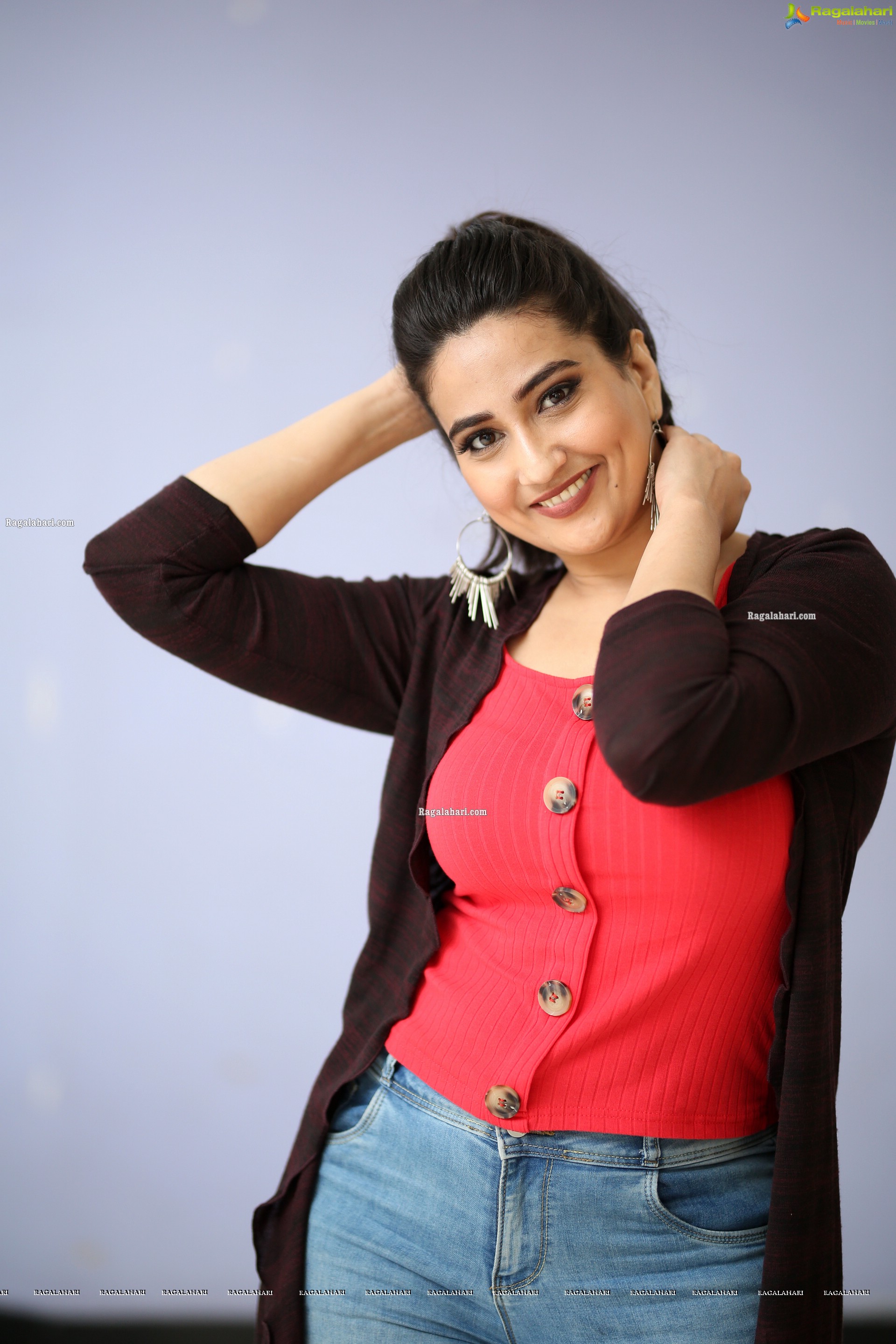 Manjusha in Pink Top and Blue Jeans With Long Shrug Exclusive Photoshoot