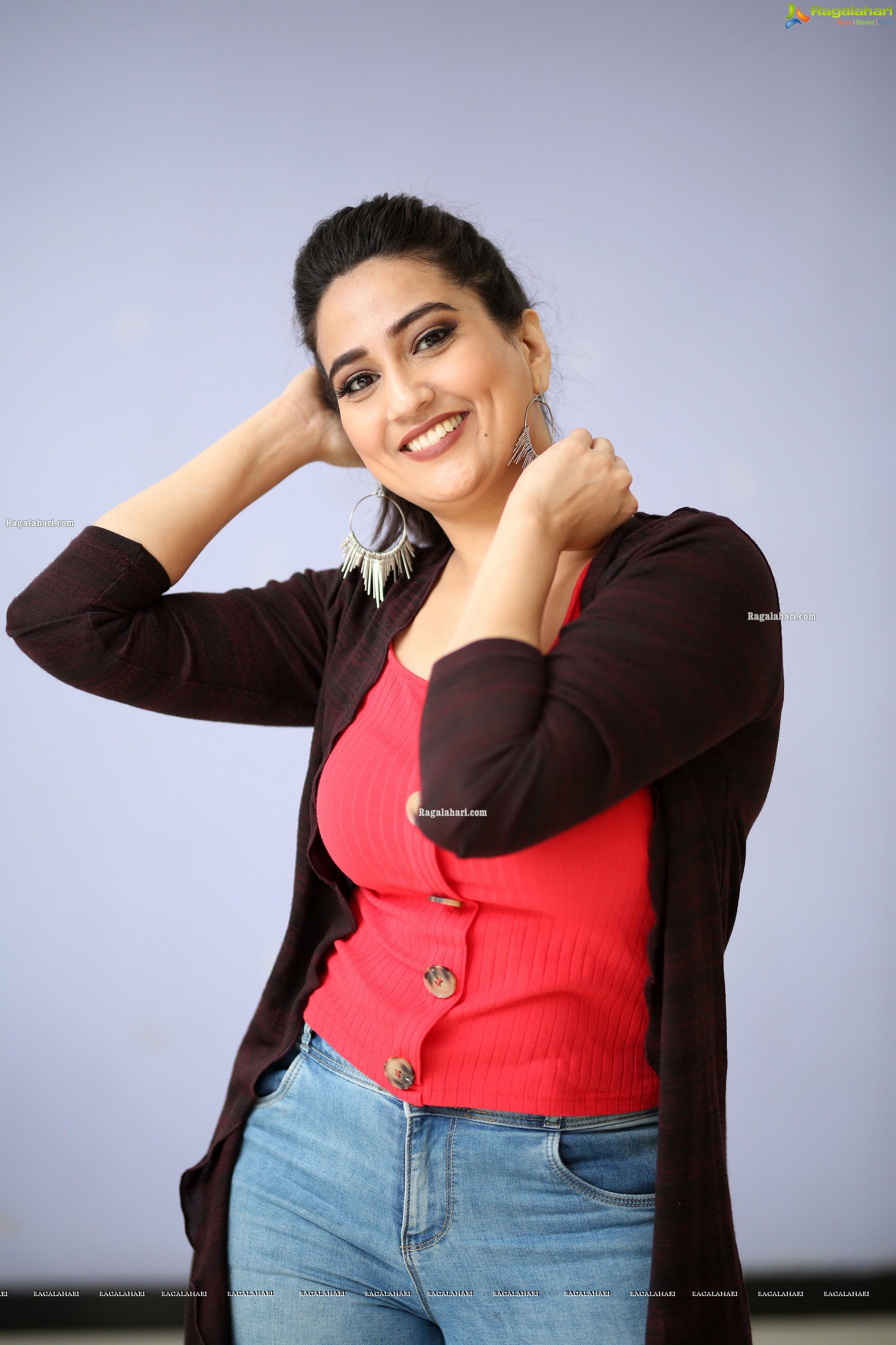 Manjusha in Pink Top and Blue Jeans With Long Shrug Exclusive Photoshoot