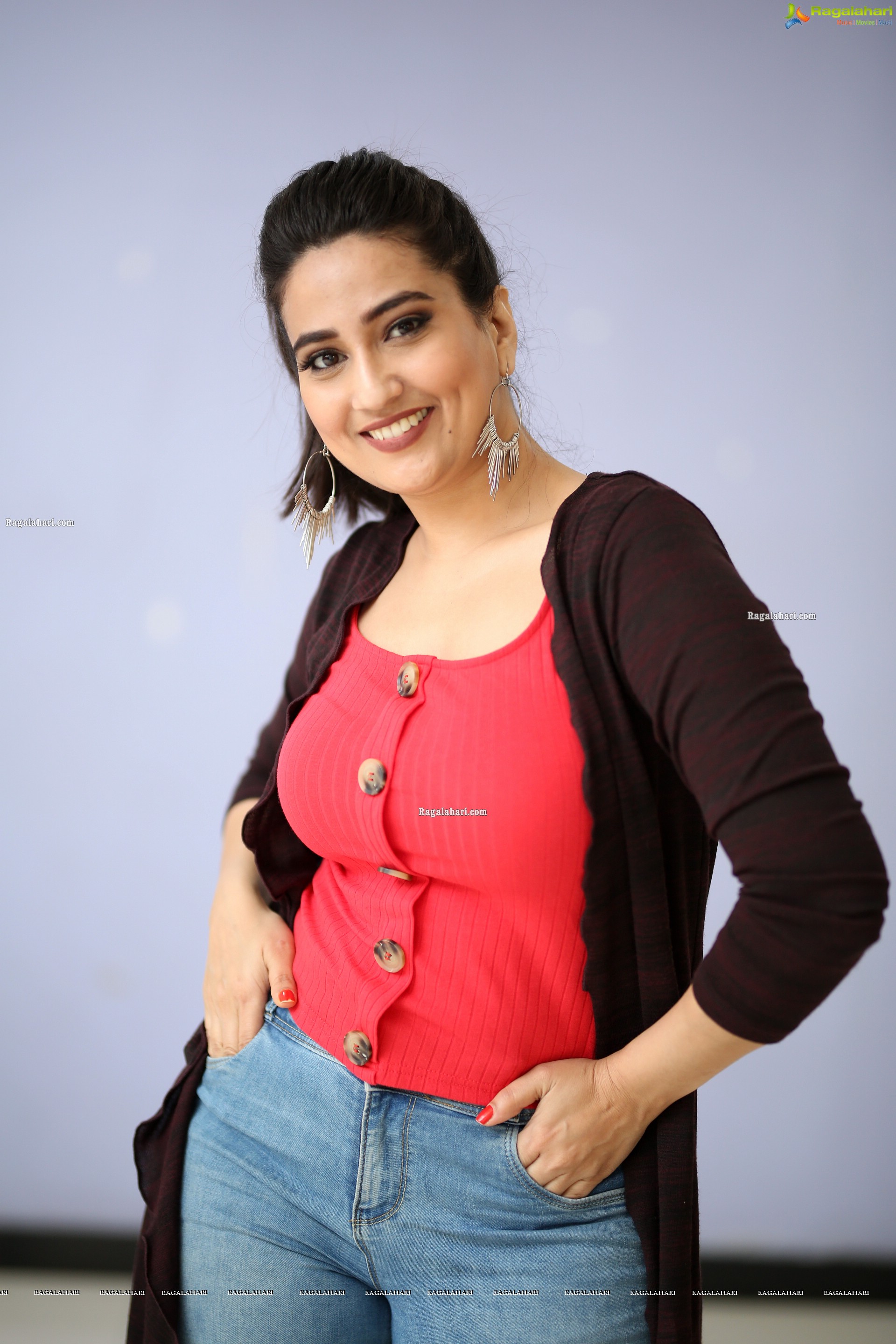 Manjusha in Pink Top and Blue Jeans With Long Shrug Exclusive Photoshoot