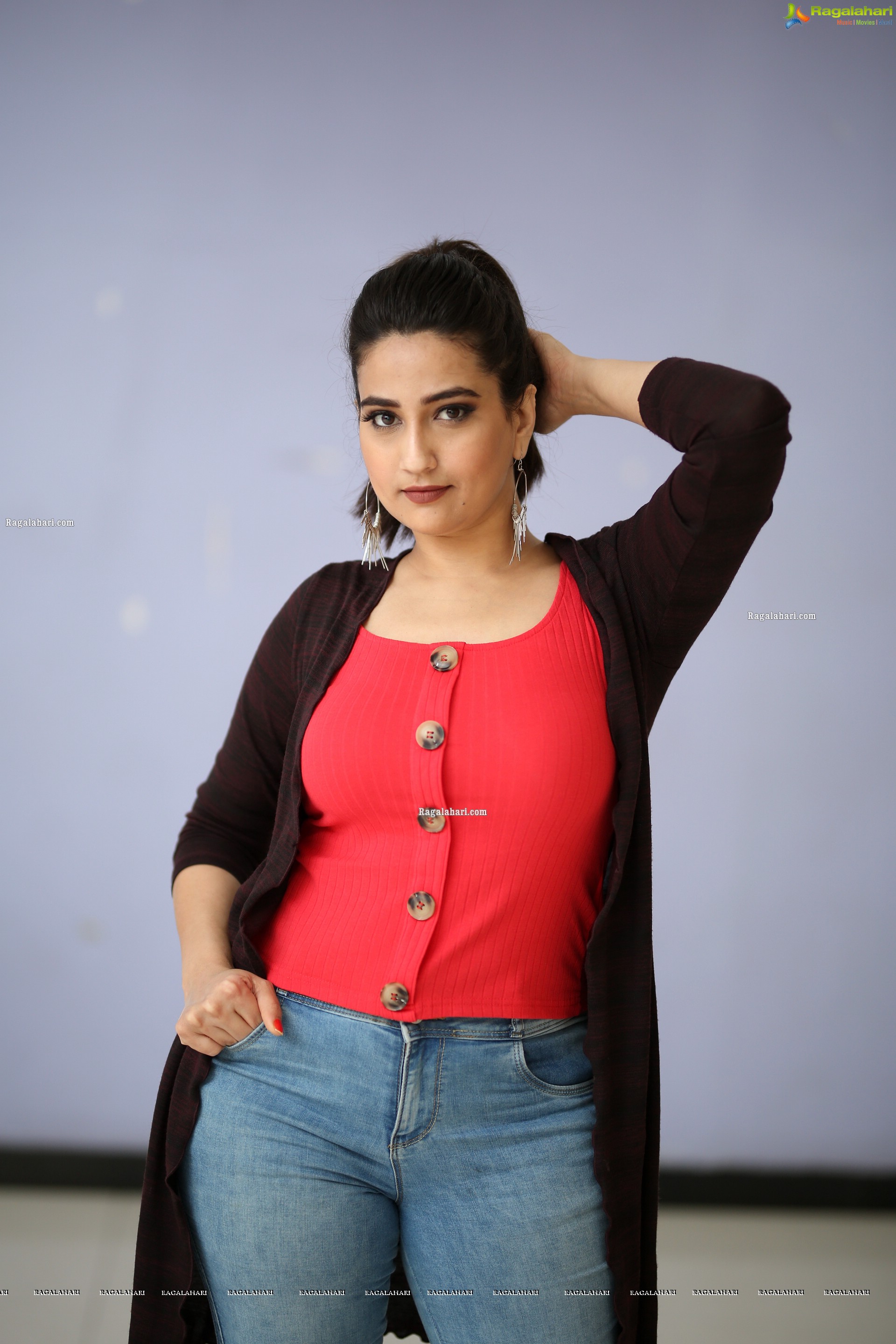 Manjusha in Pink Top and Blue Jeans With Long Shrug Exclusive Photoshoot