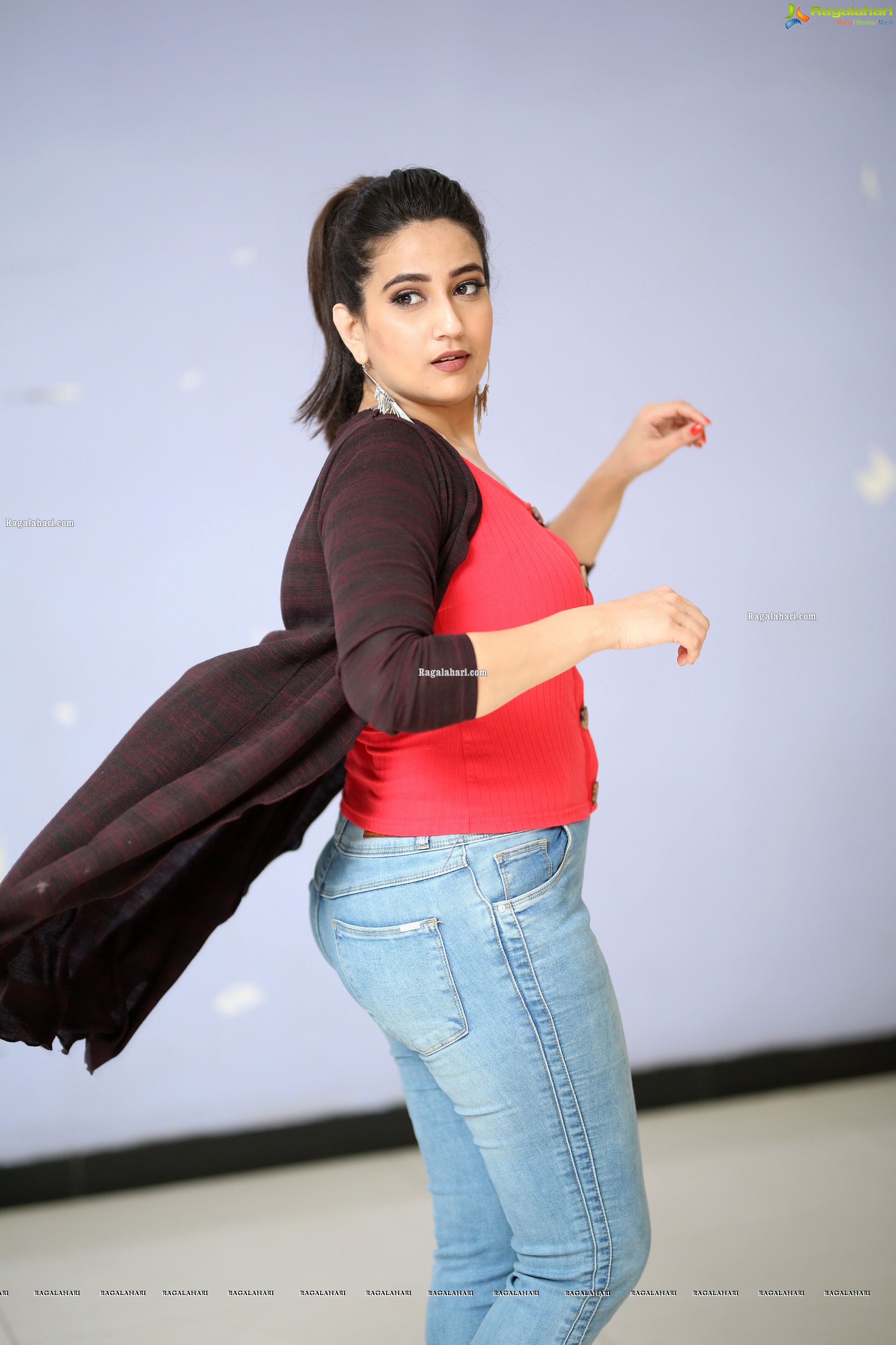 Manjusha in Pink Top and Blue Jeans With Long Shrug Exclusive Photoshoot