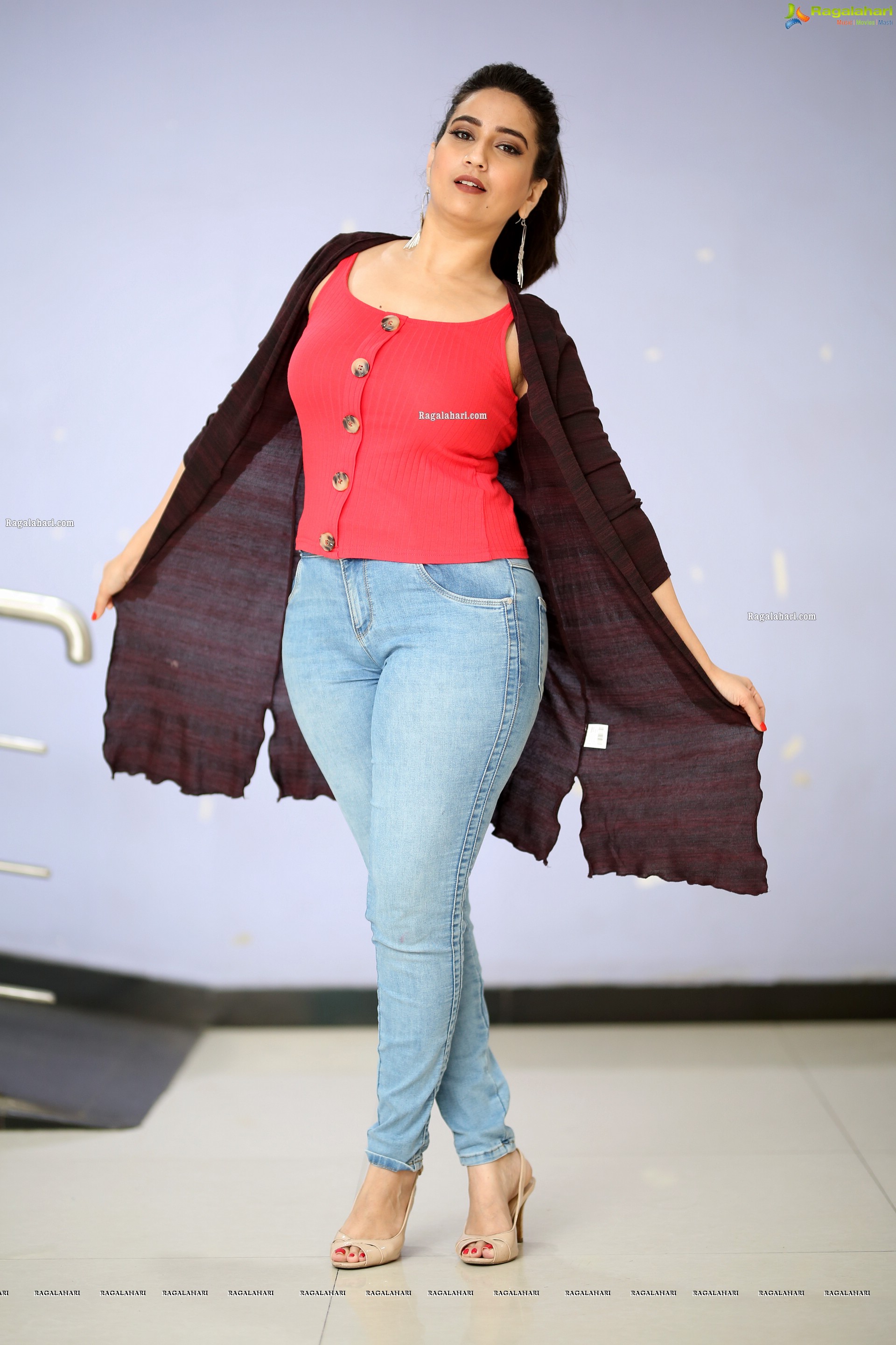 Manjusha in Pink Top and Blue Jeans With Long Shrug Exclusive Photoshoot
