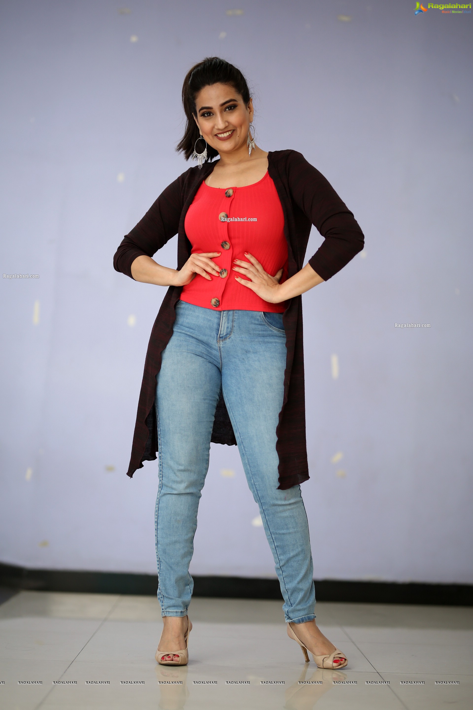 Manjusha in Pink Top and Blue Jeans With Long Shrug Exclusive Photoshoot