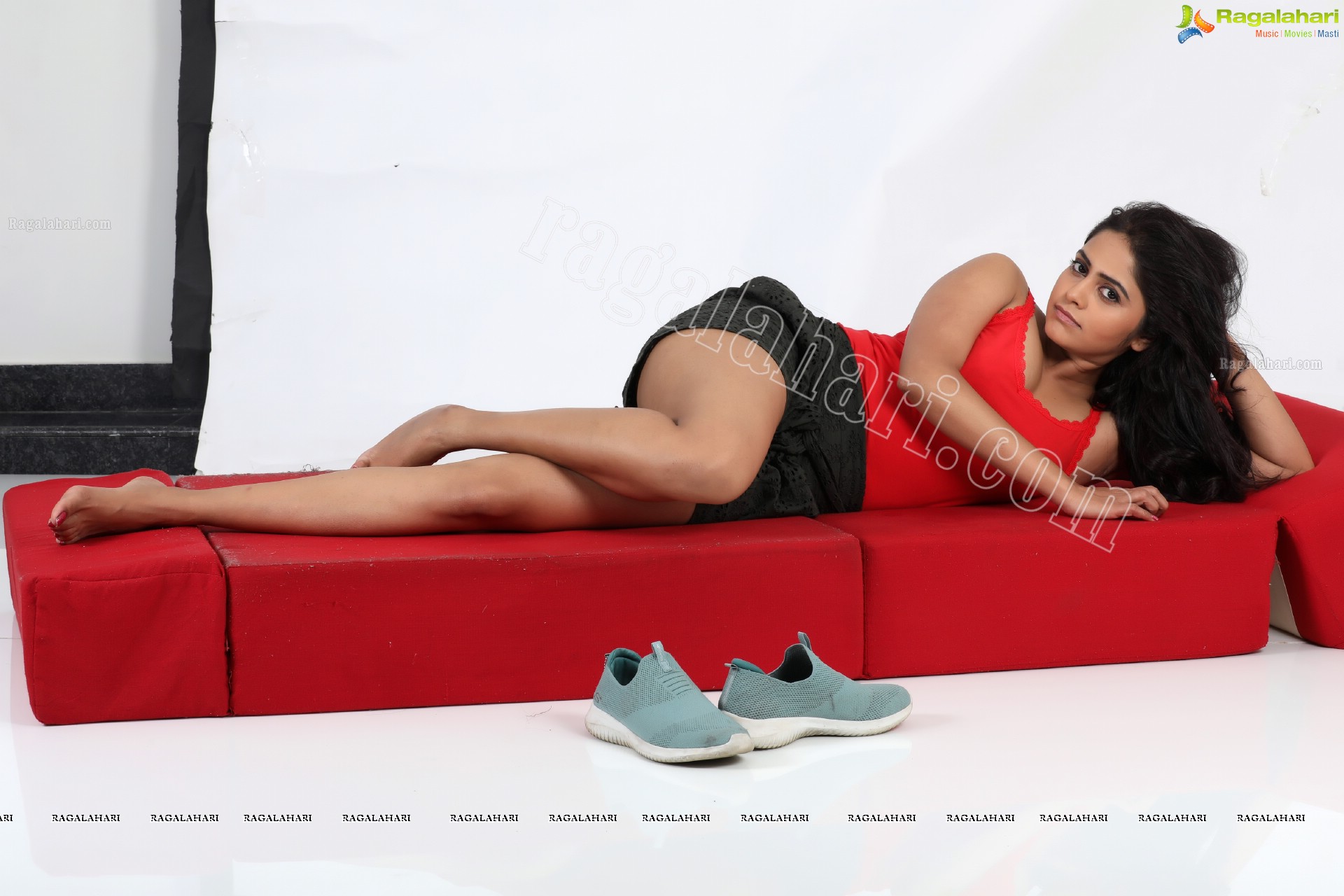 Pragya Nayan in Red Tank Top and Black Mini Skirt Exclusive Photo Shoot