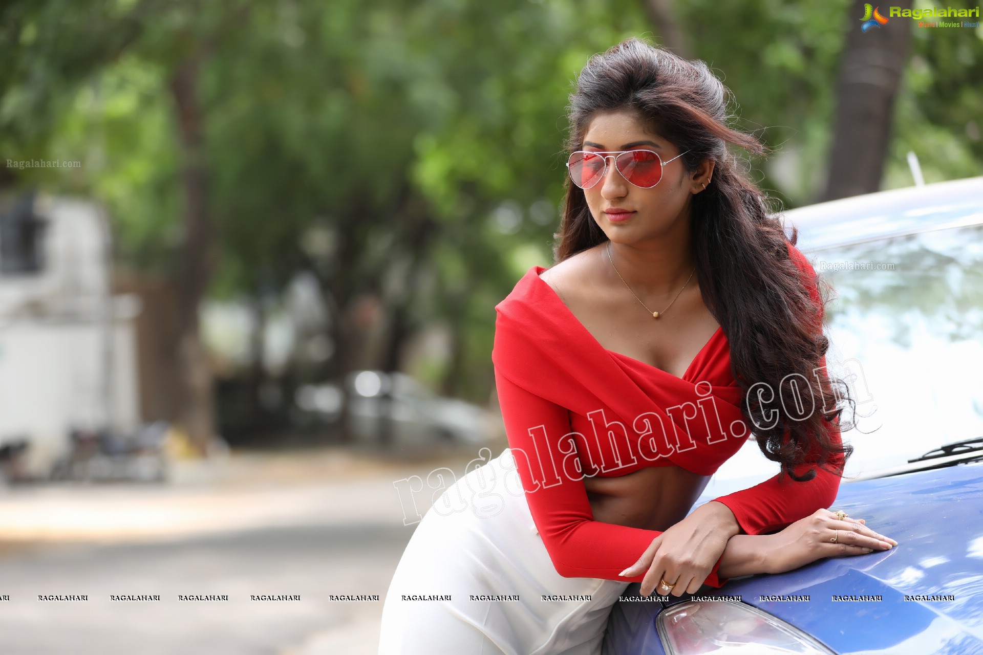 Sravani Yadav in Red Wrapped Top and White Pant Exclusive Photo Shoot