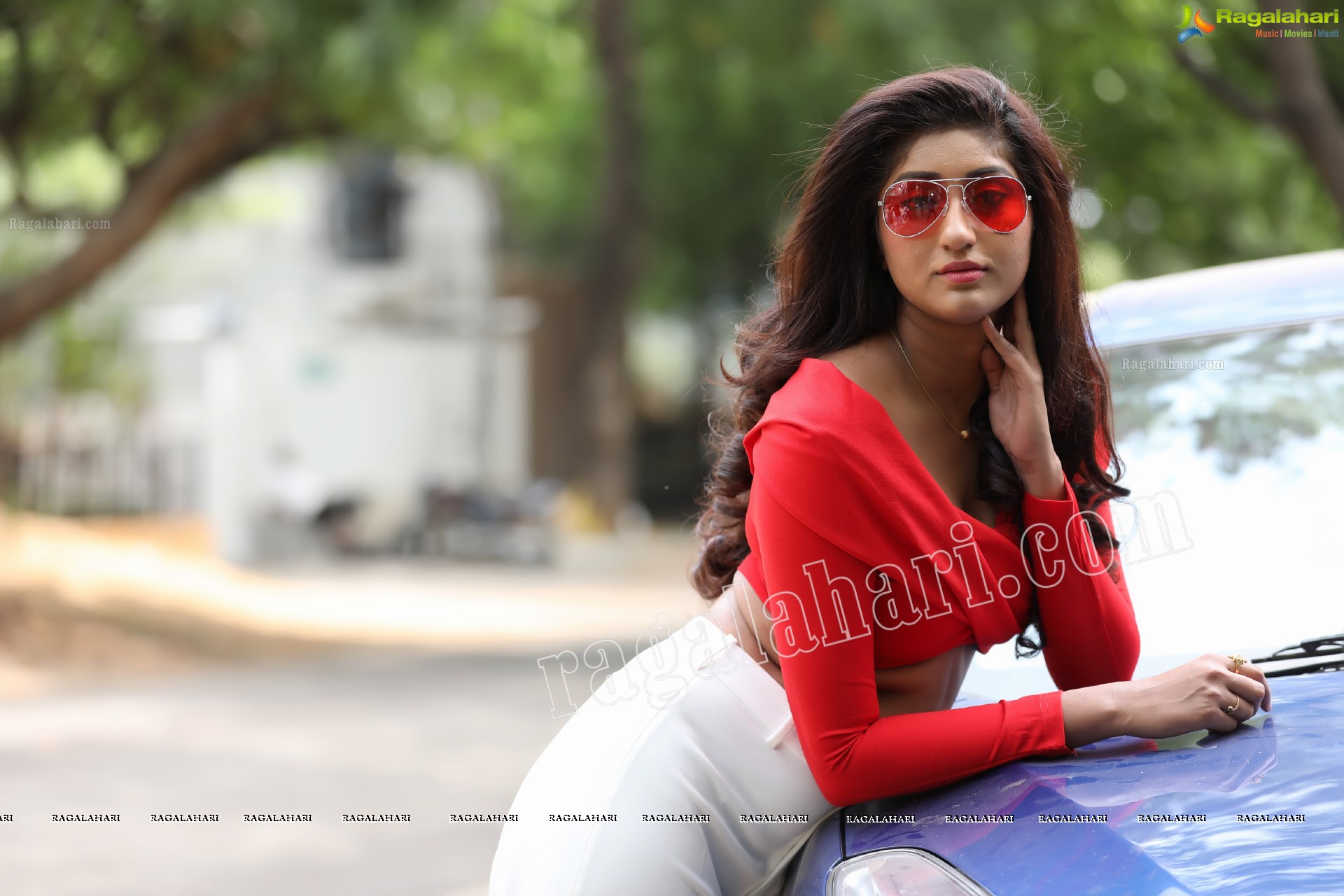 Sravani Yadav in Red Wrapped Top and White Pant Exclusive Photo Shoot